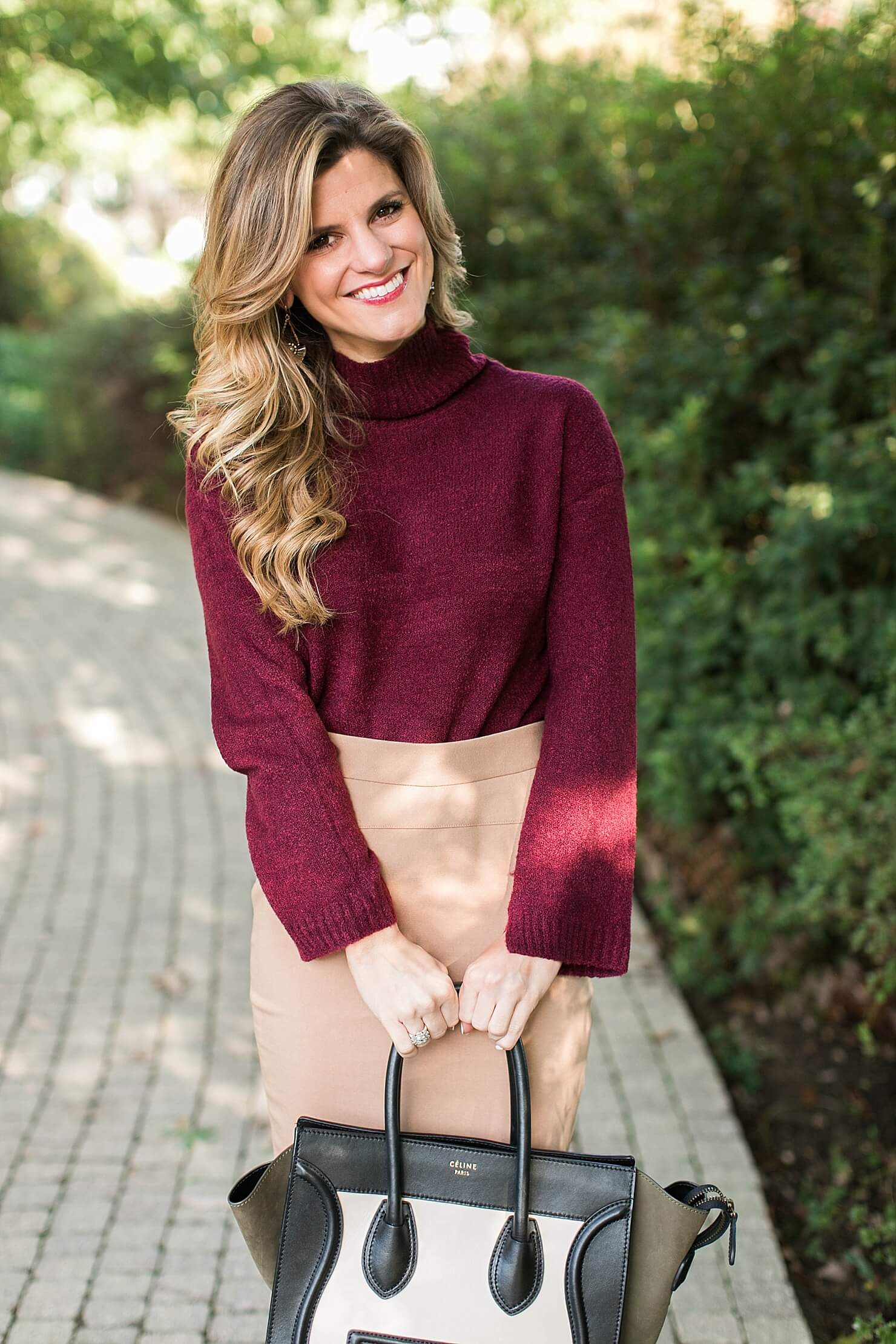 tan pencil skirt and burgundy sweater for business snappy attire