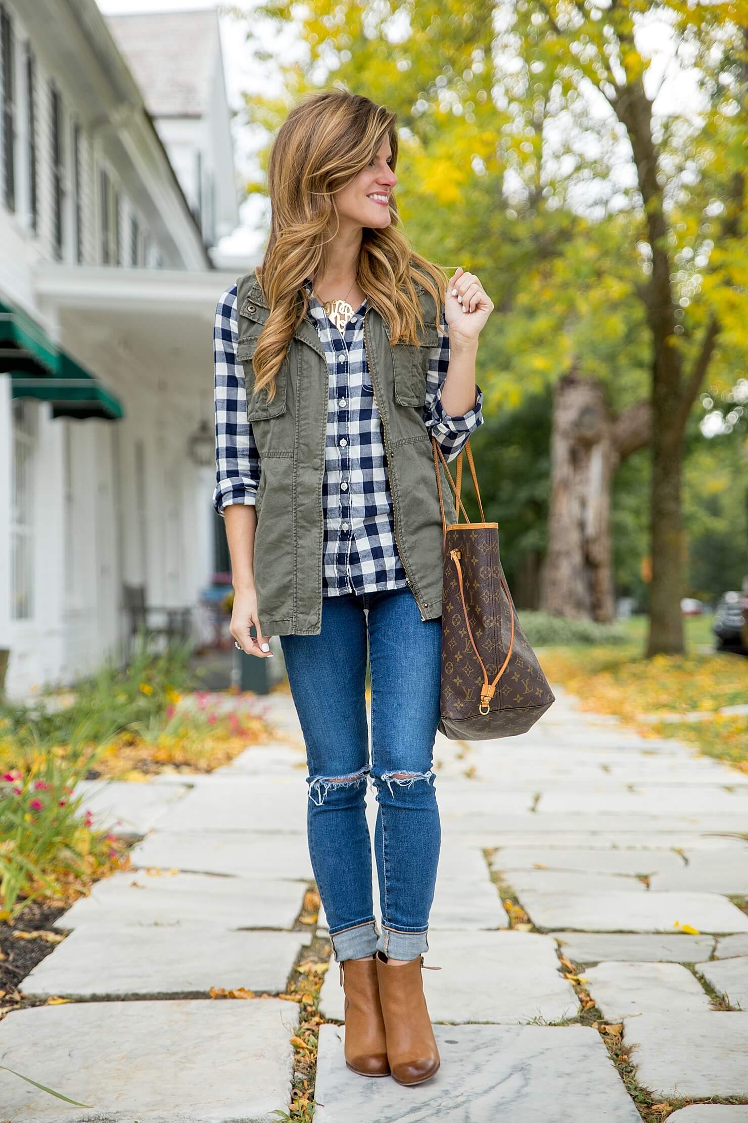gingham shirt, rolled up jeans, cognac ankle booties, rolled jeans and booties, gingham shirt and utility vest, LV neverfull monogram tote GM, fall outfit