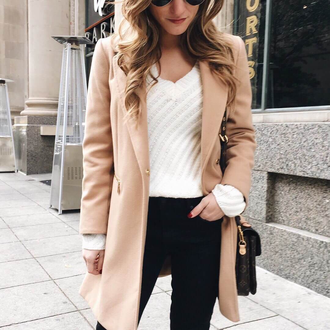 brighton the day styling tan long coat, cream sweater, black jeans