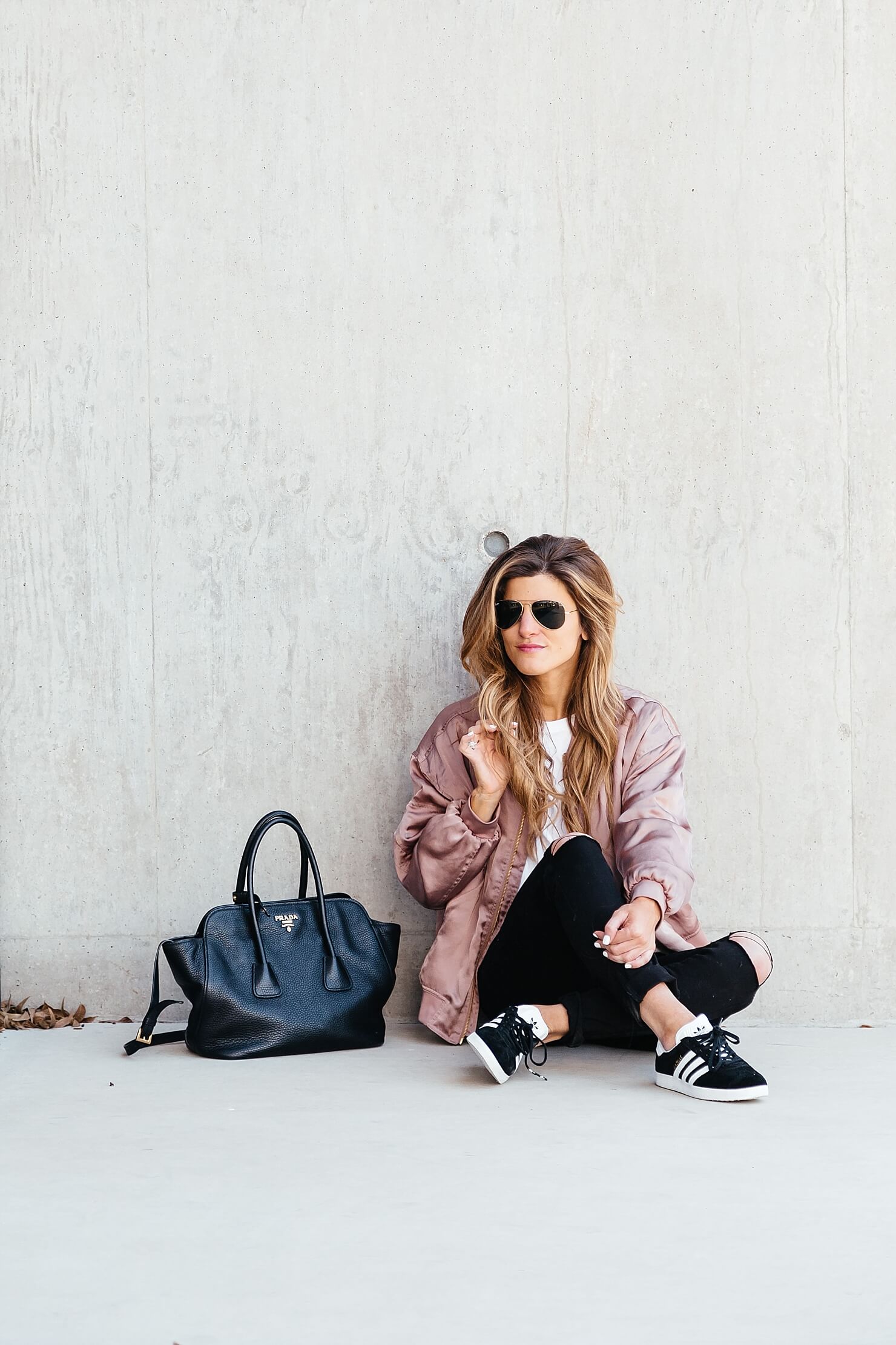 sincerely jules lips and lashes tee, leith pink bomber jacket, black jeans, casual everyday outfit, adidas gazelle sneakers