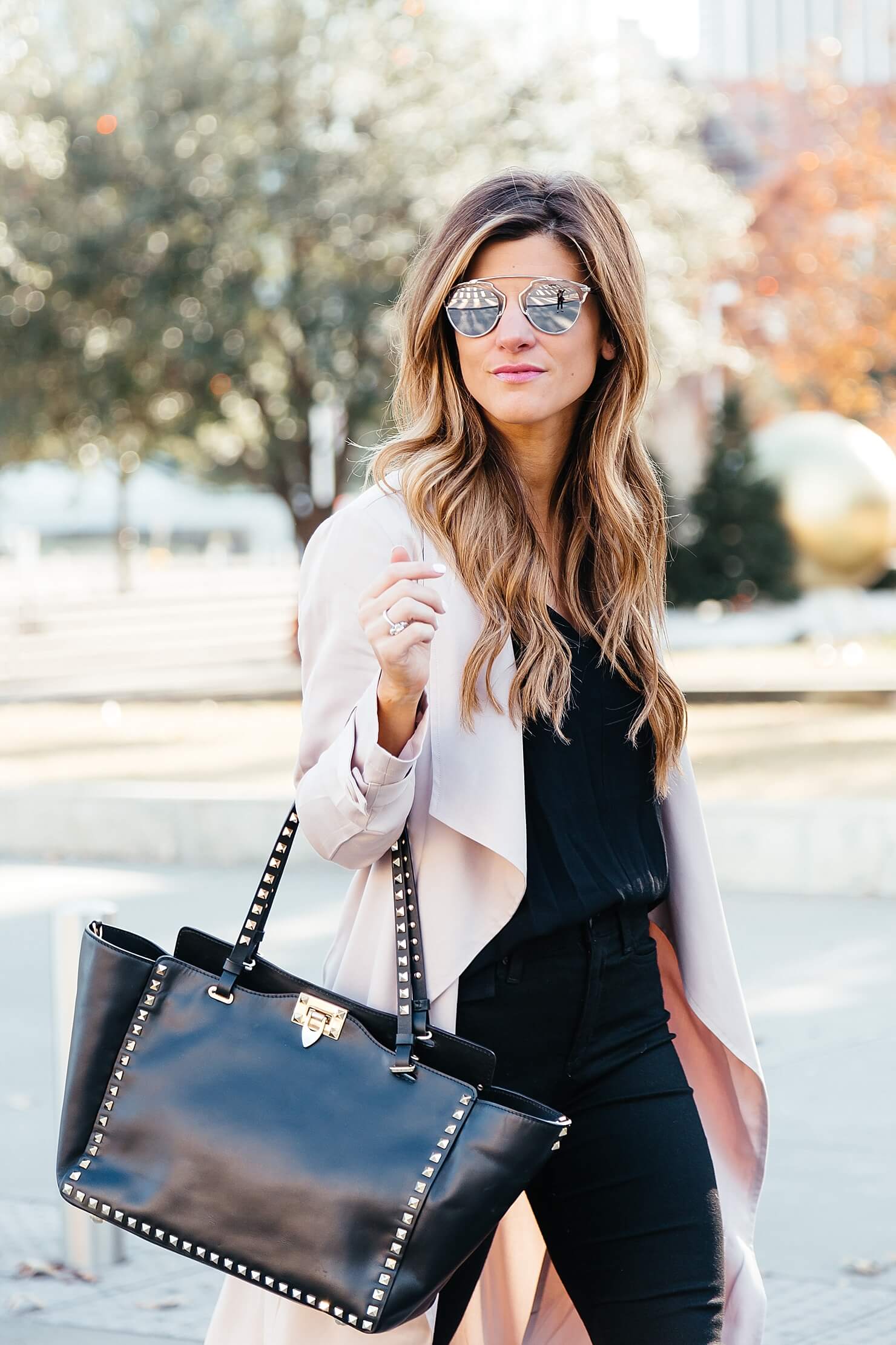 all black outfit, blush pink duster coat, pink trench coat, black on black going out look