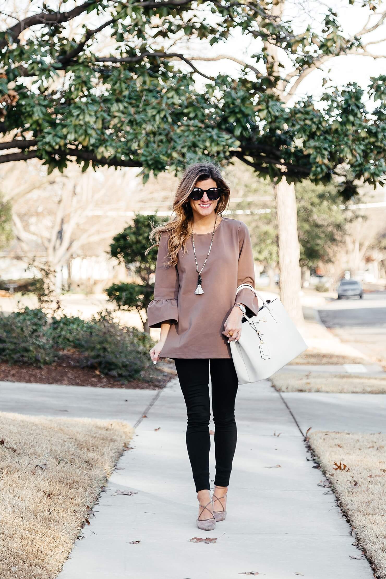 brighton the day peplum sleeve top and black pants with lace up flats