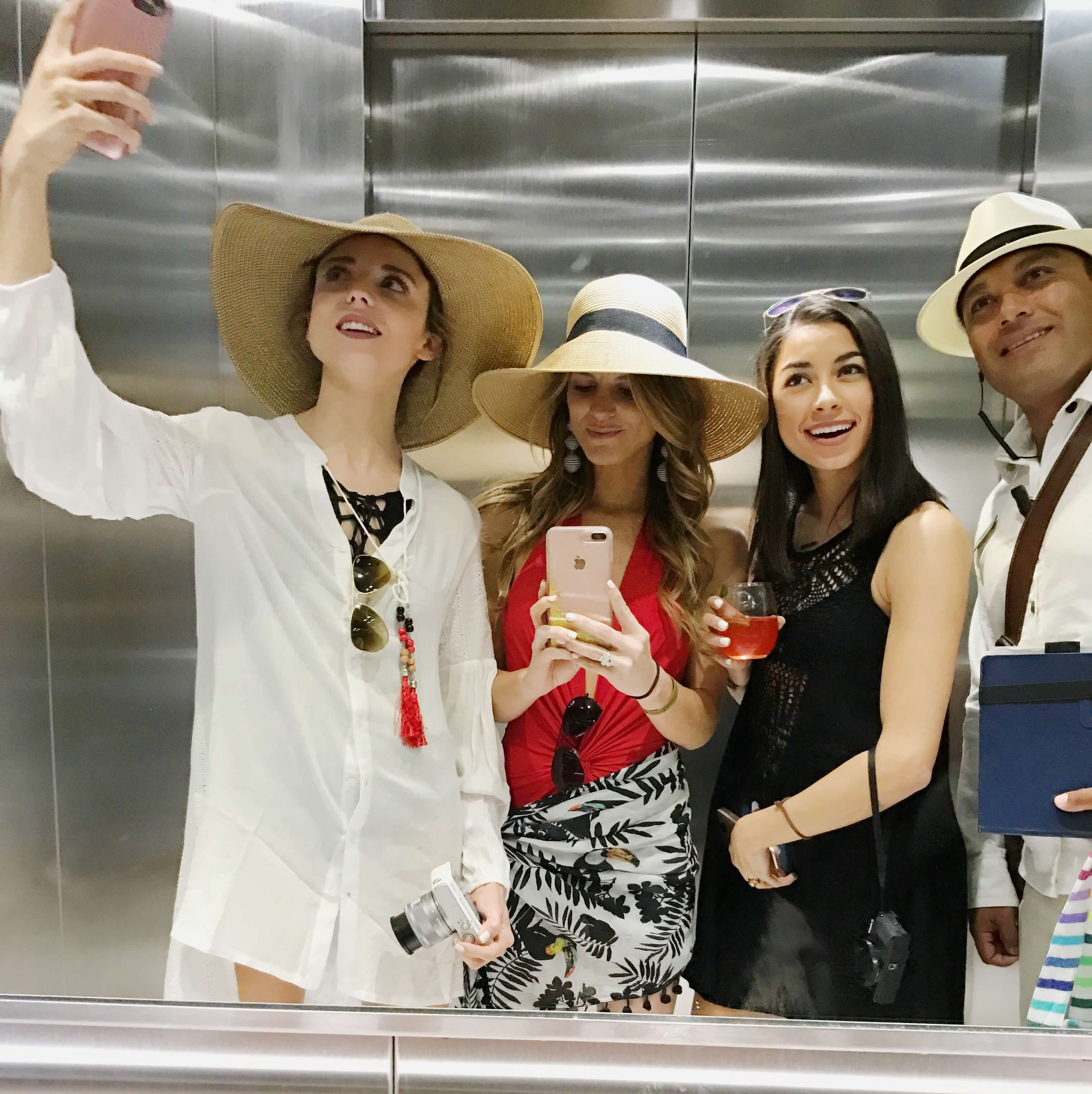 mirror selfie in elevator with Dani, Brighton and Manuel, our awesome butler
