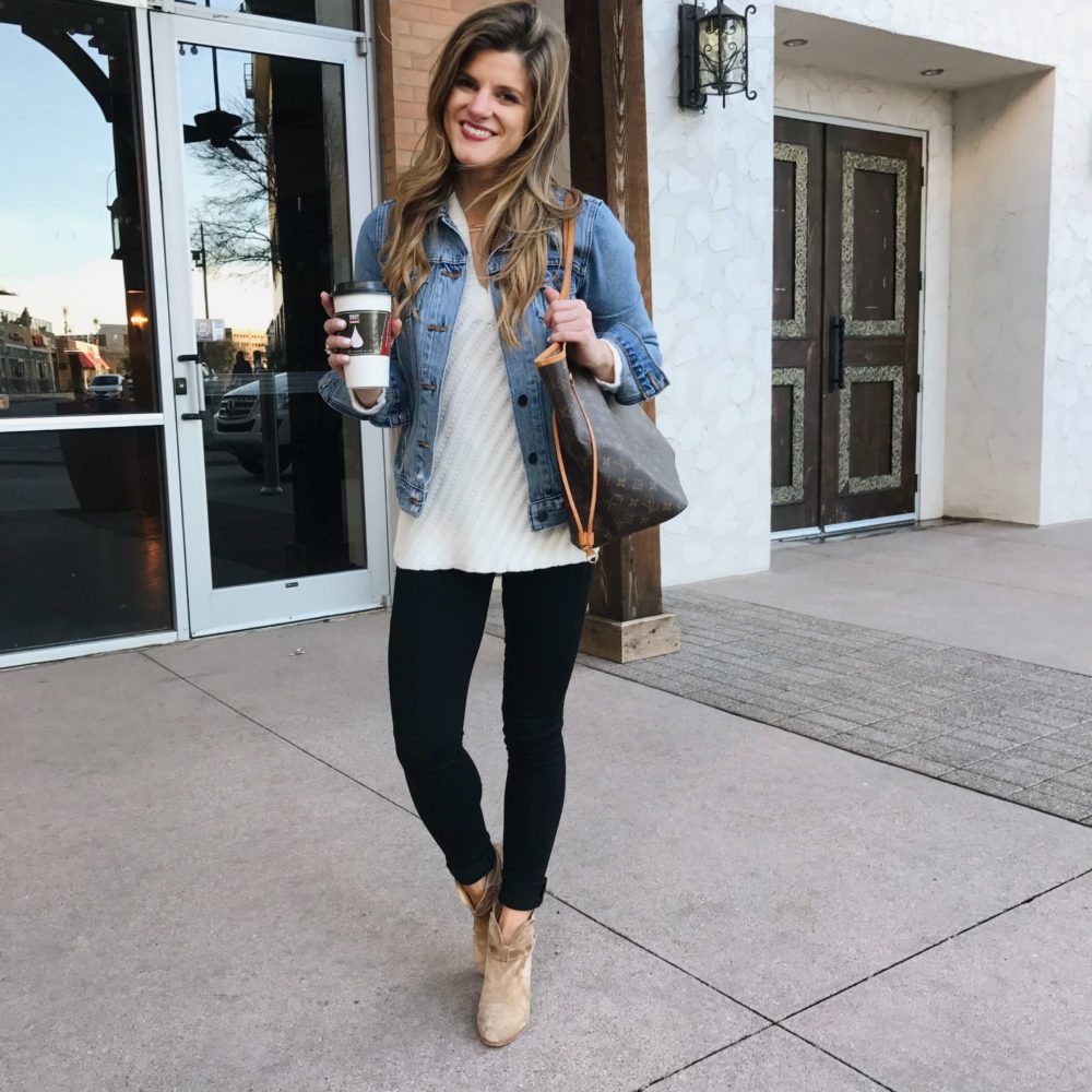 how to wear black jeans black jeans outfit with cream sweater, denim jacket, brown booties