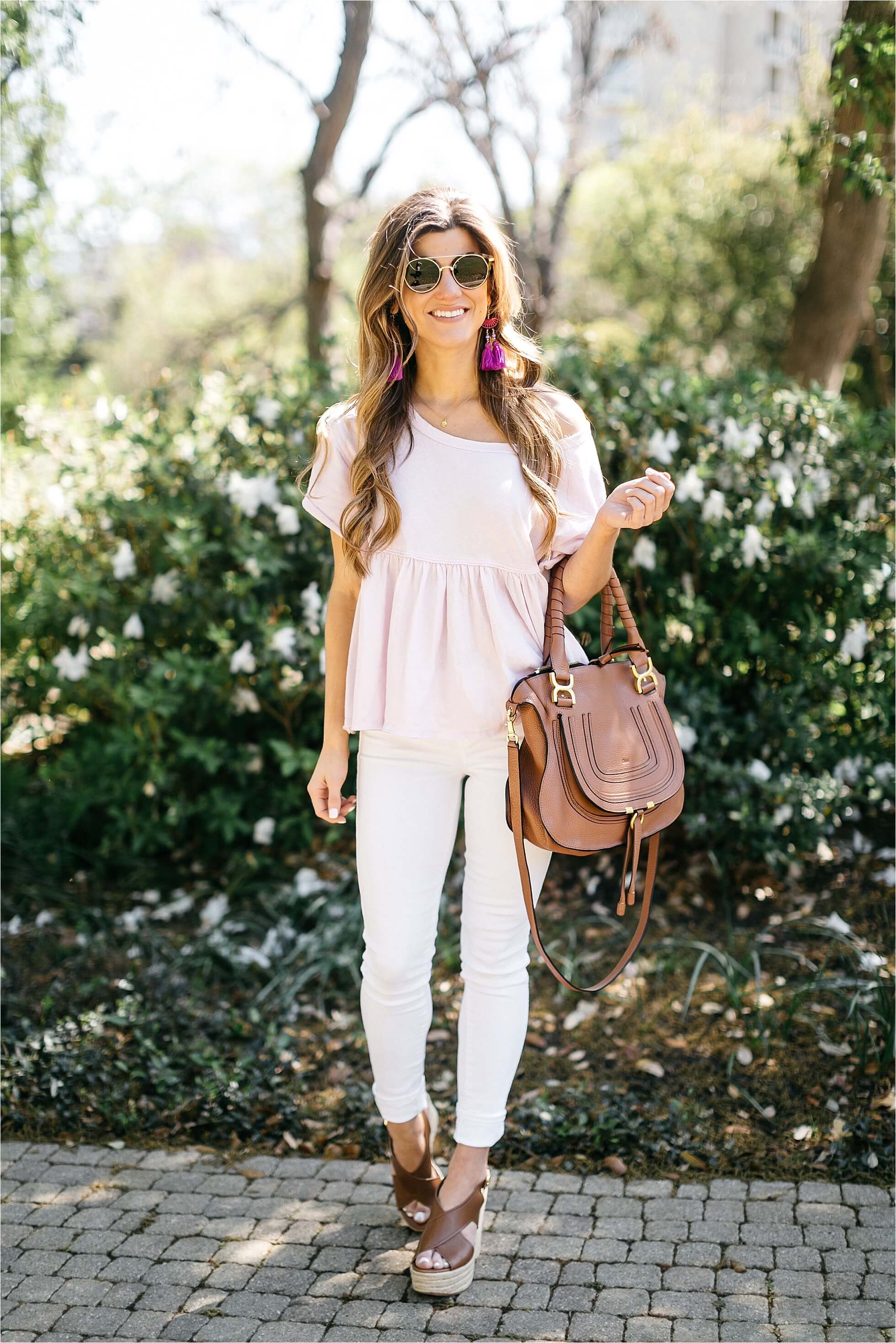 white jeans outfit, pastel peplum hem ruffle tee, cognac leather wedge, spring outfit idea