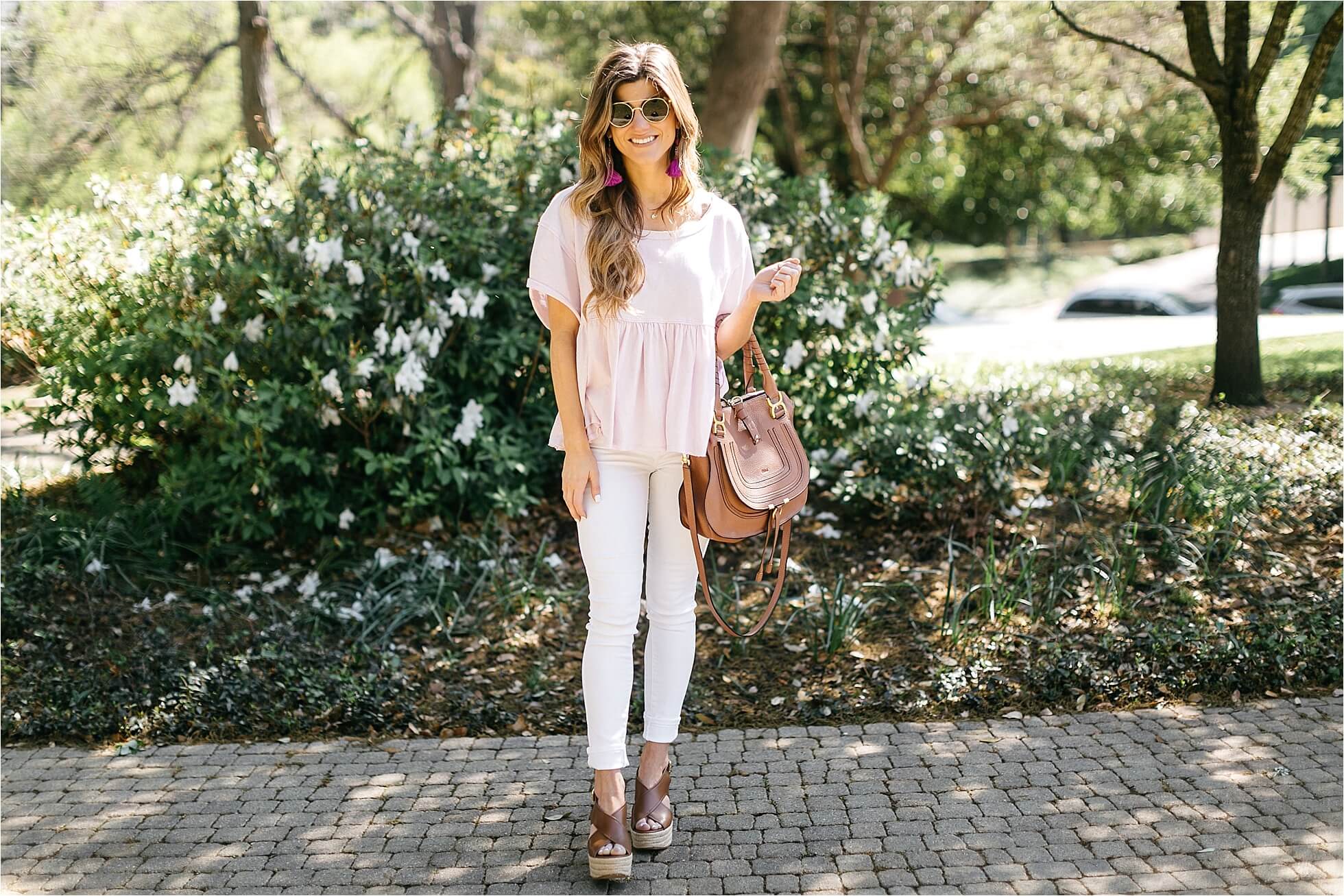 white jeans outfit, pastel peplum hem ruffle tee, cognac leather wedge, spring outfit idea