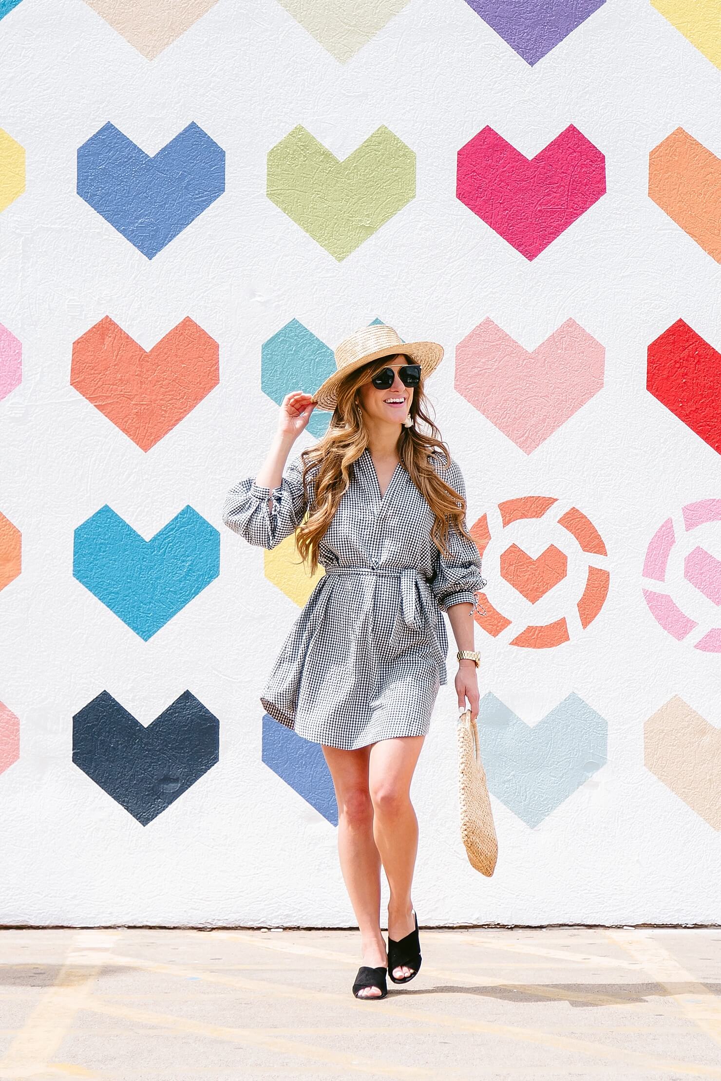 brighton keller wearing gingham dress with mules and boater hat 