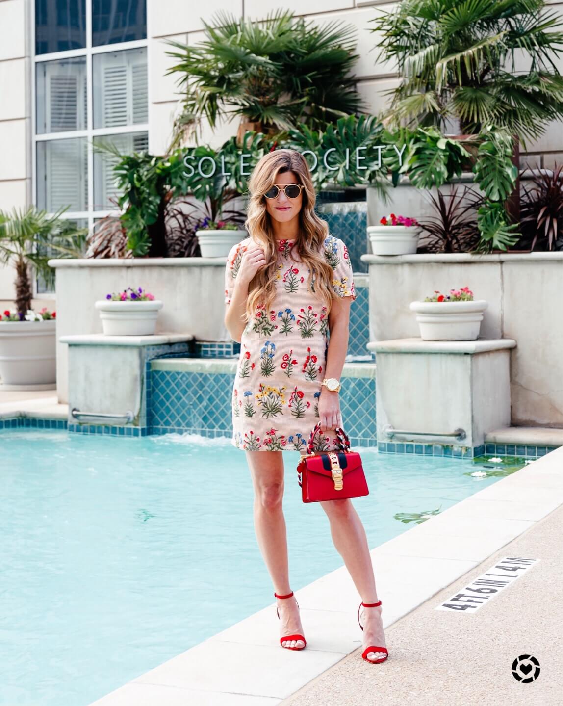 Brighton Keller at Reward Style night 1 pool party, wearing embroidered dress