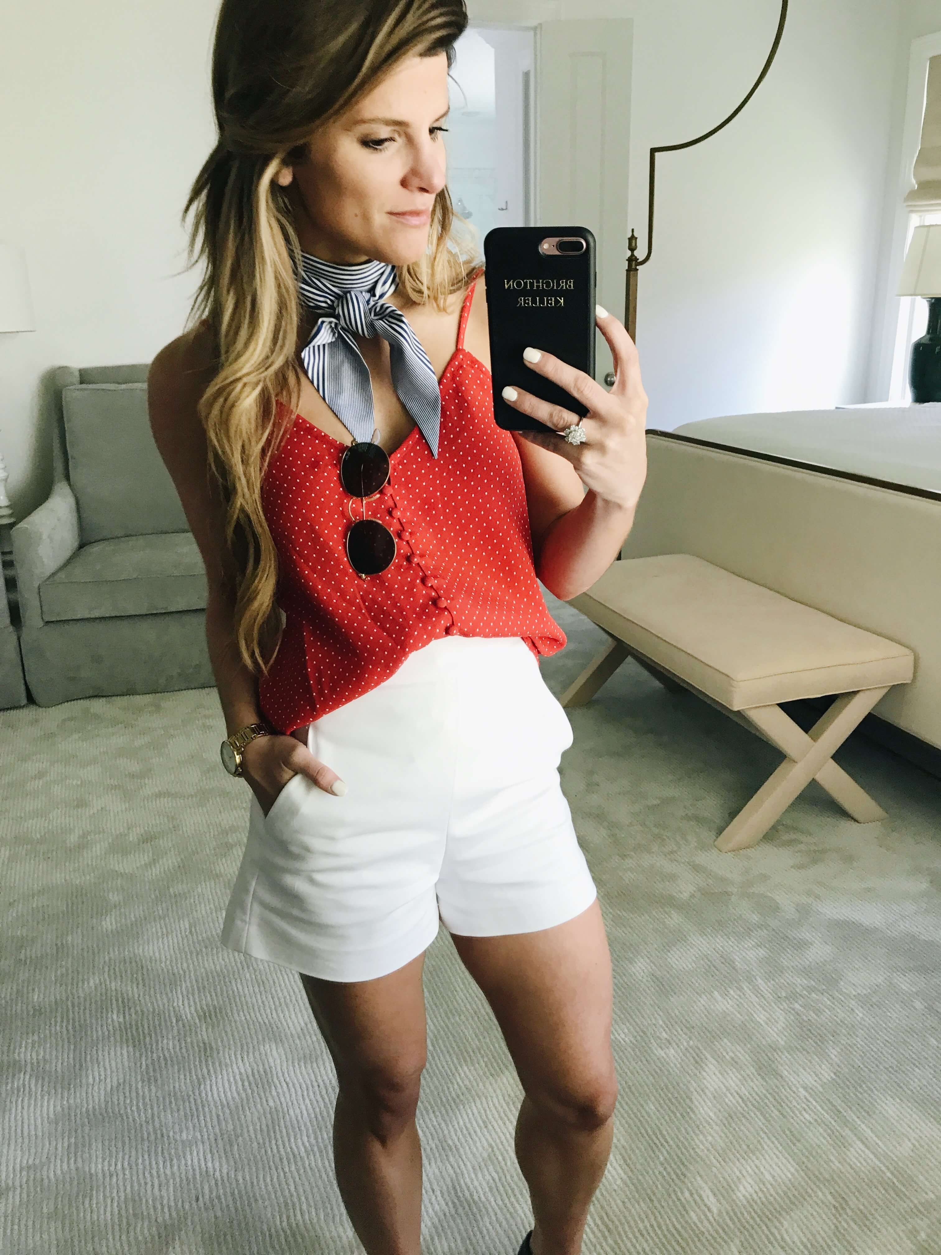mixing prints, mirror selfie wearing red and white polka dotted tank with blue and white striped silk neck scarf