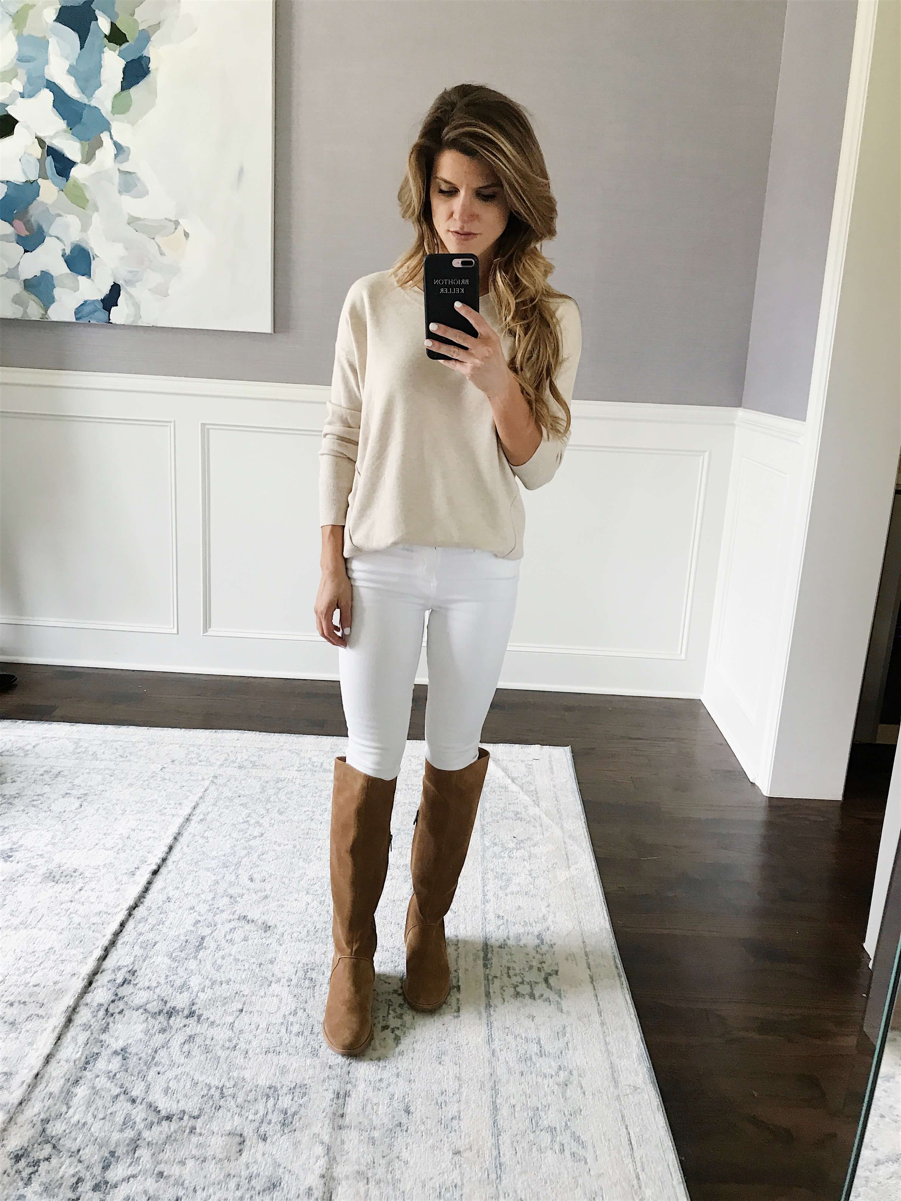 cream cardigan with white jeans and suede brown boots 