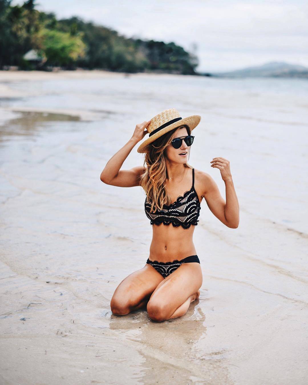 brighton keller on the beach of fiji island wearing black lace bikini 
