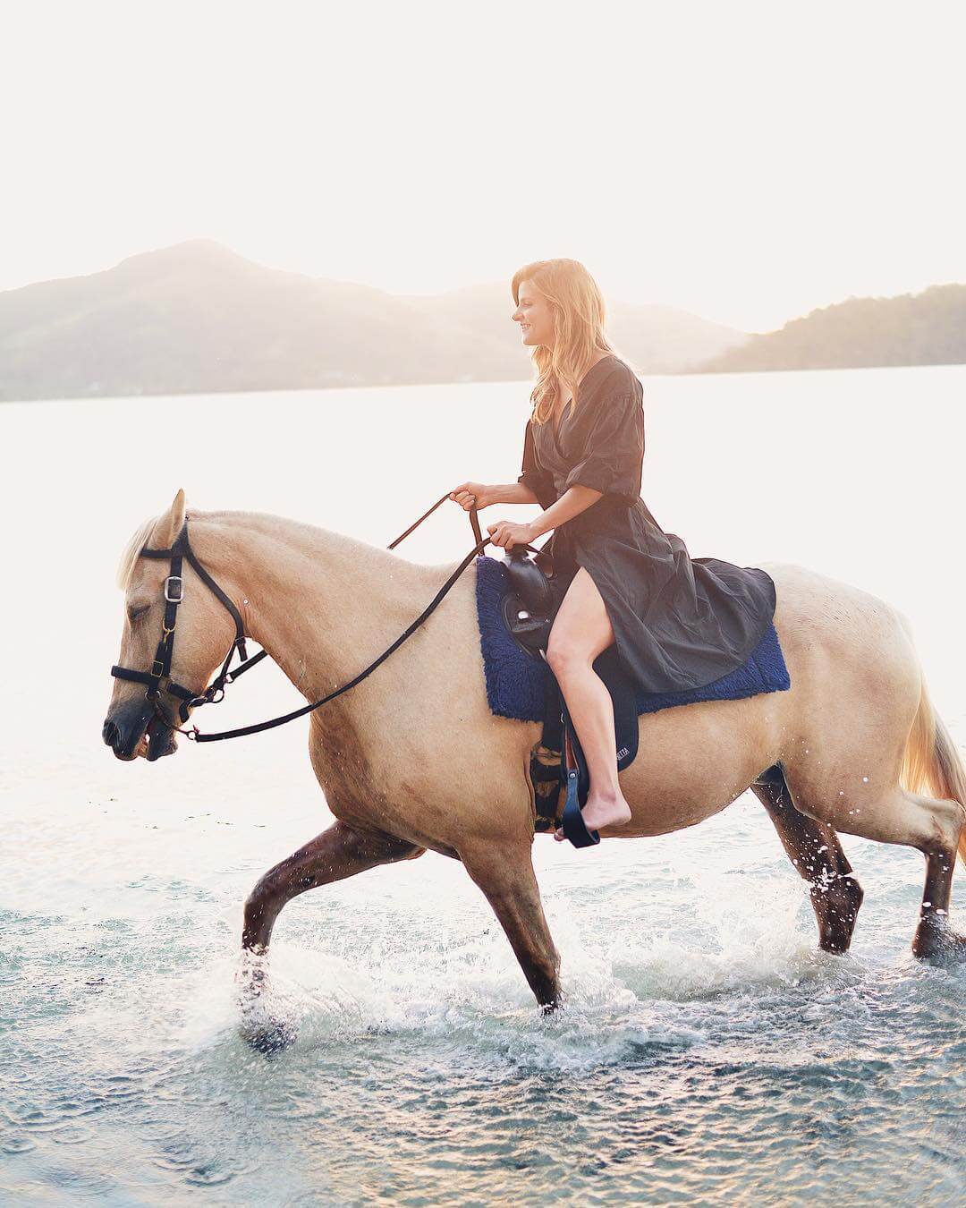 horseback riding on the beach wearing topshop wrap dress