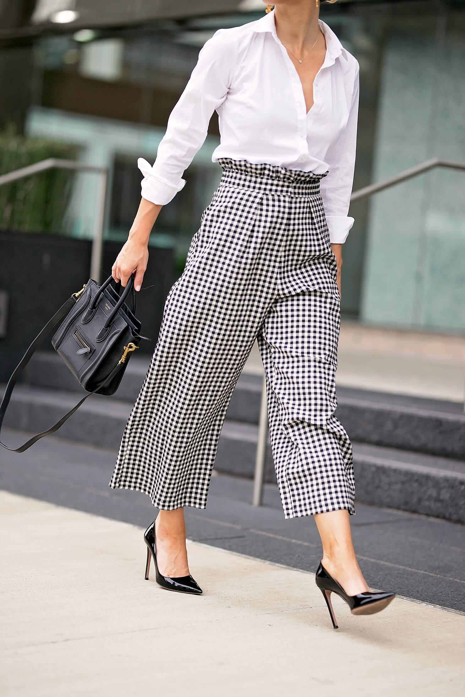 brightoabest business podcastsn keller wearing gingham pants with white button down and black pointy toe pumps