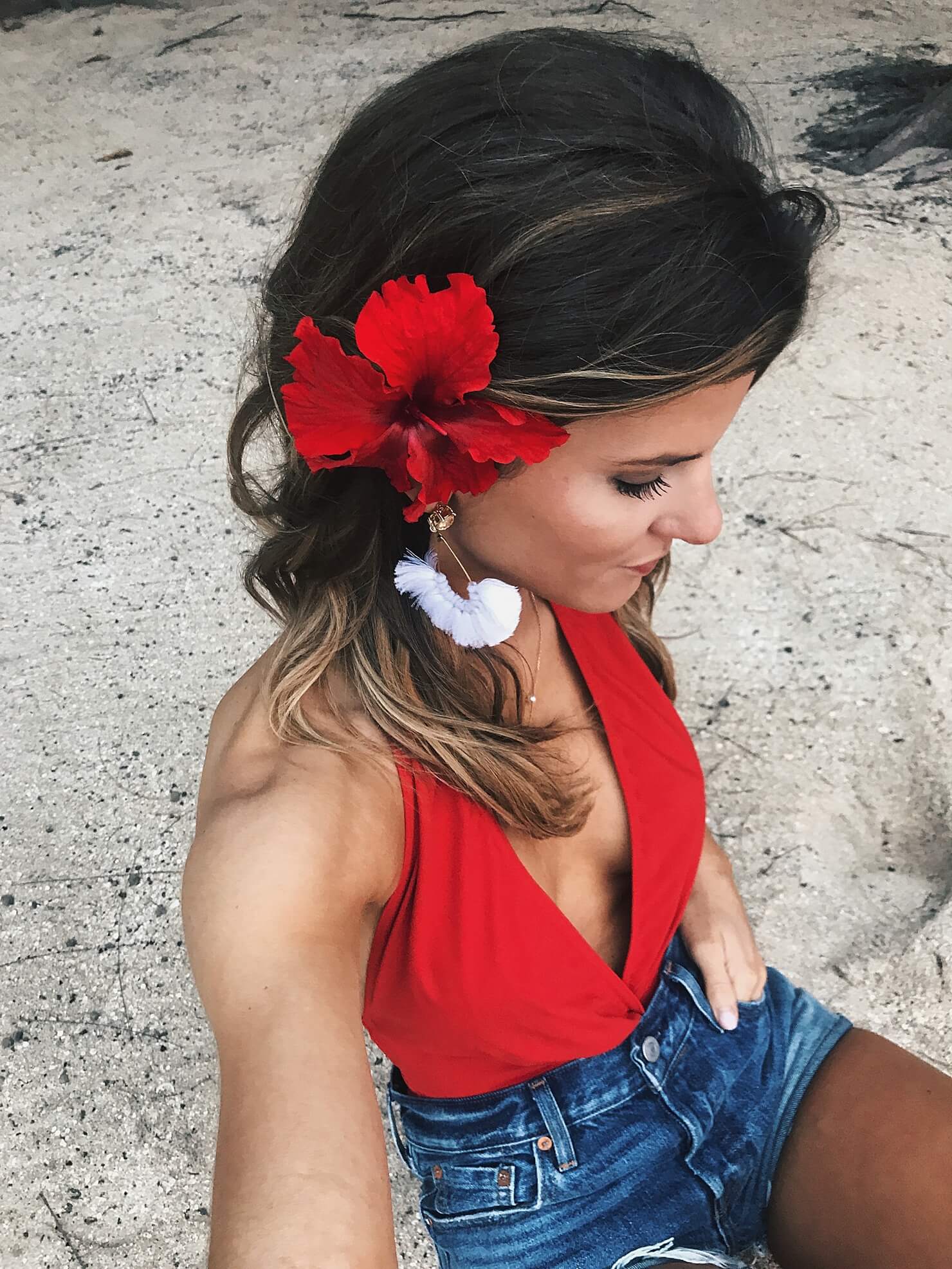 red bikini and white statement earrings from the styled collective