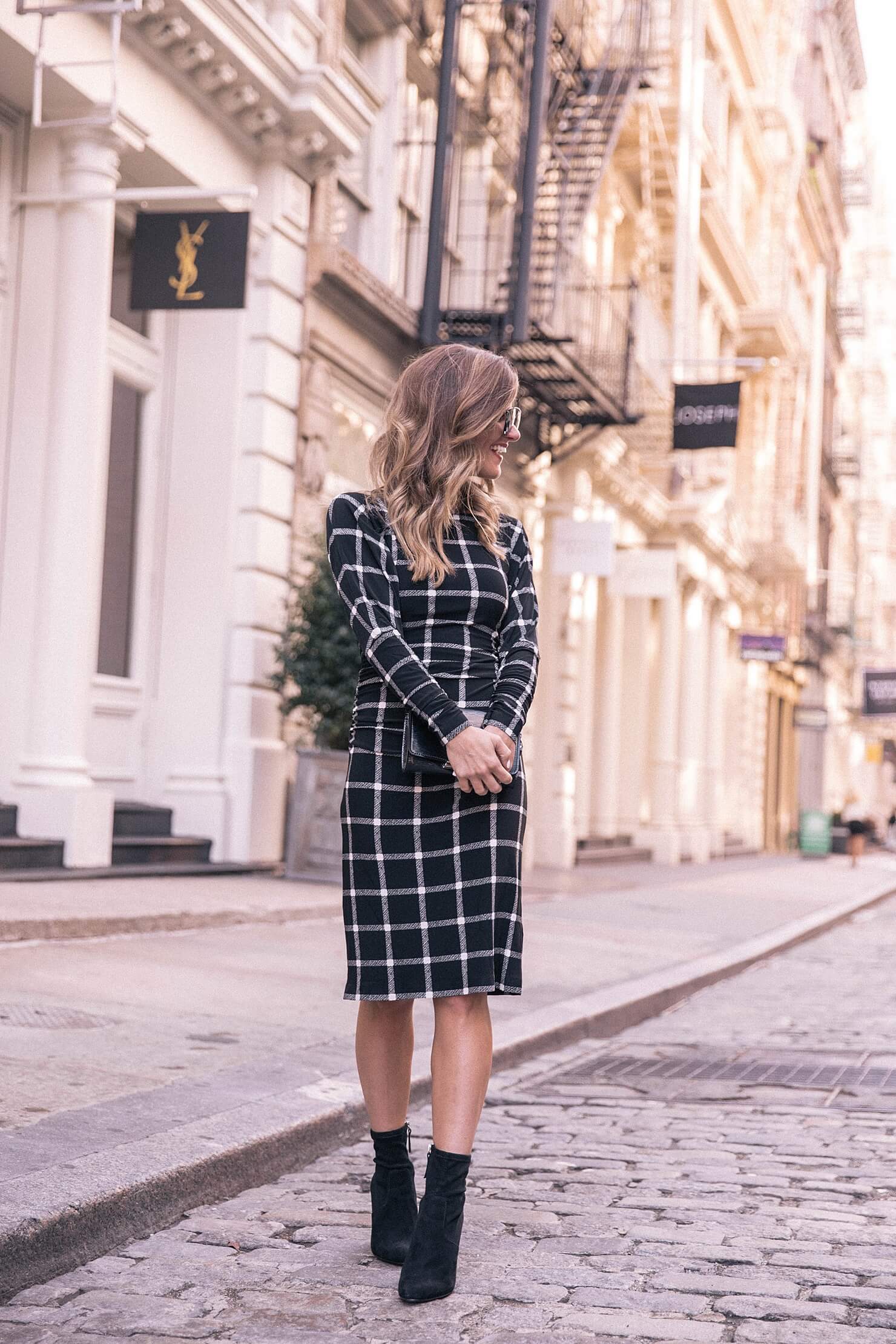 black and white plaid dolman dress with black booties 