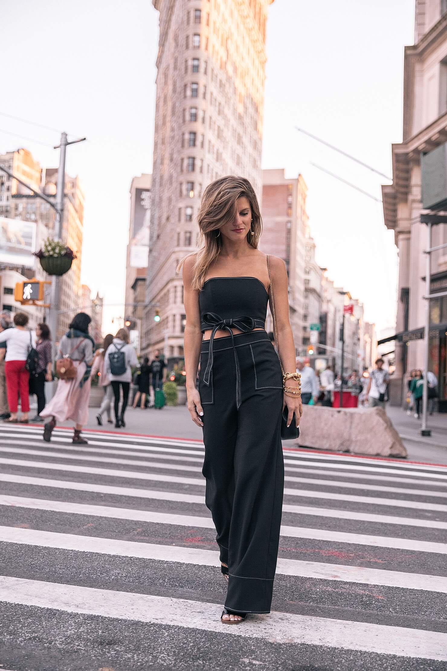 brighton keller wearing lovers and friends matching set in front of flatiron building in NYC