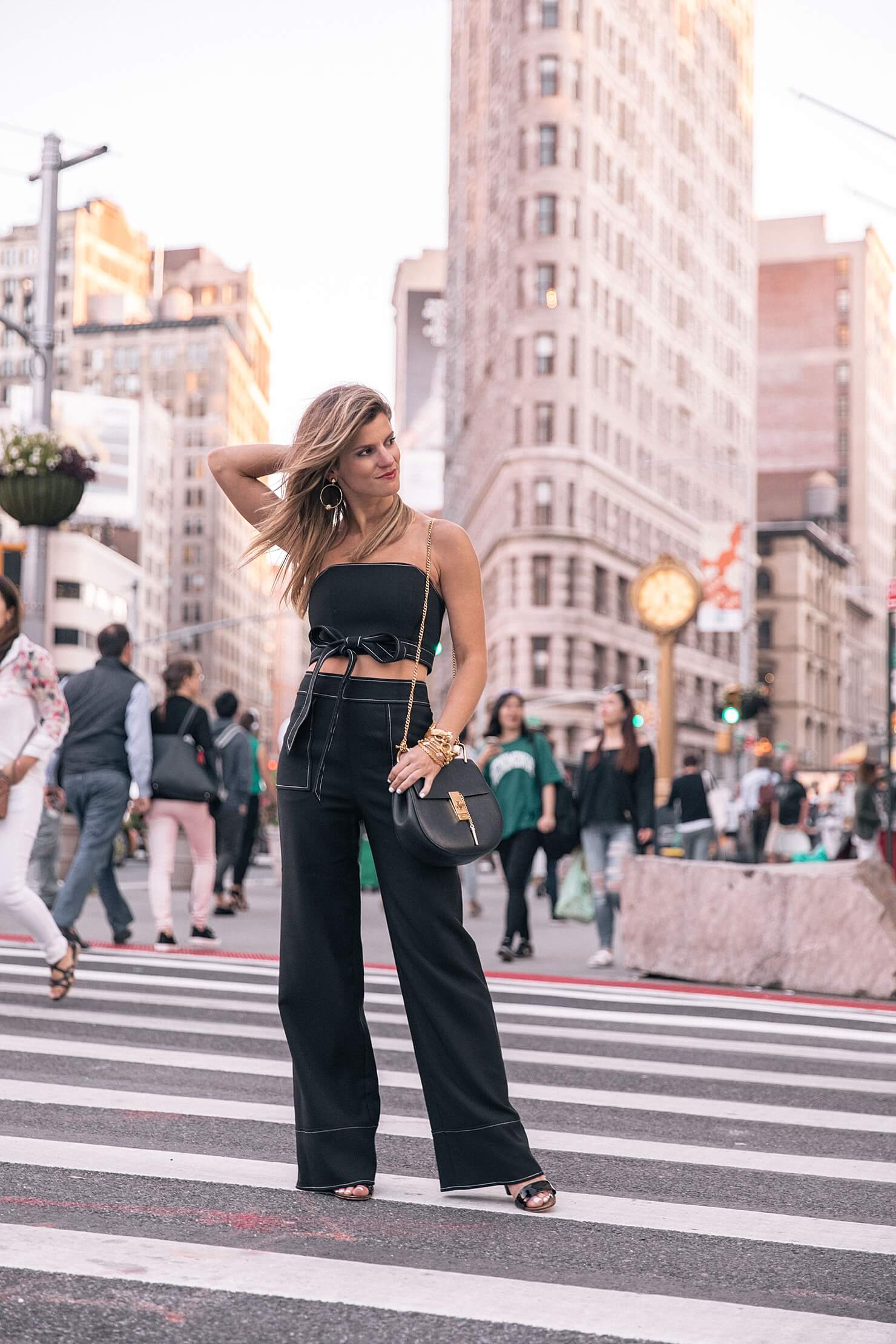 brighton keller wearing lovers and friends matching set in front of flatiron building in NYC