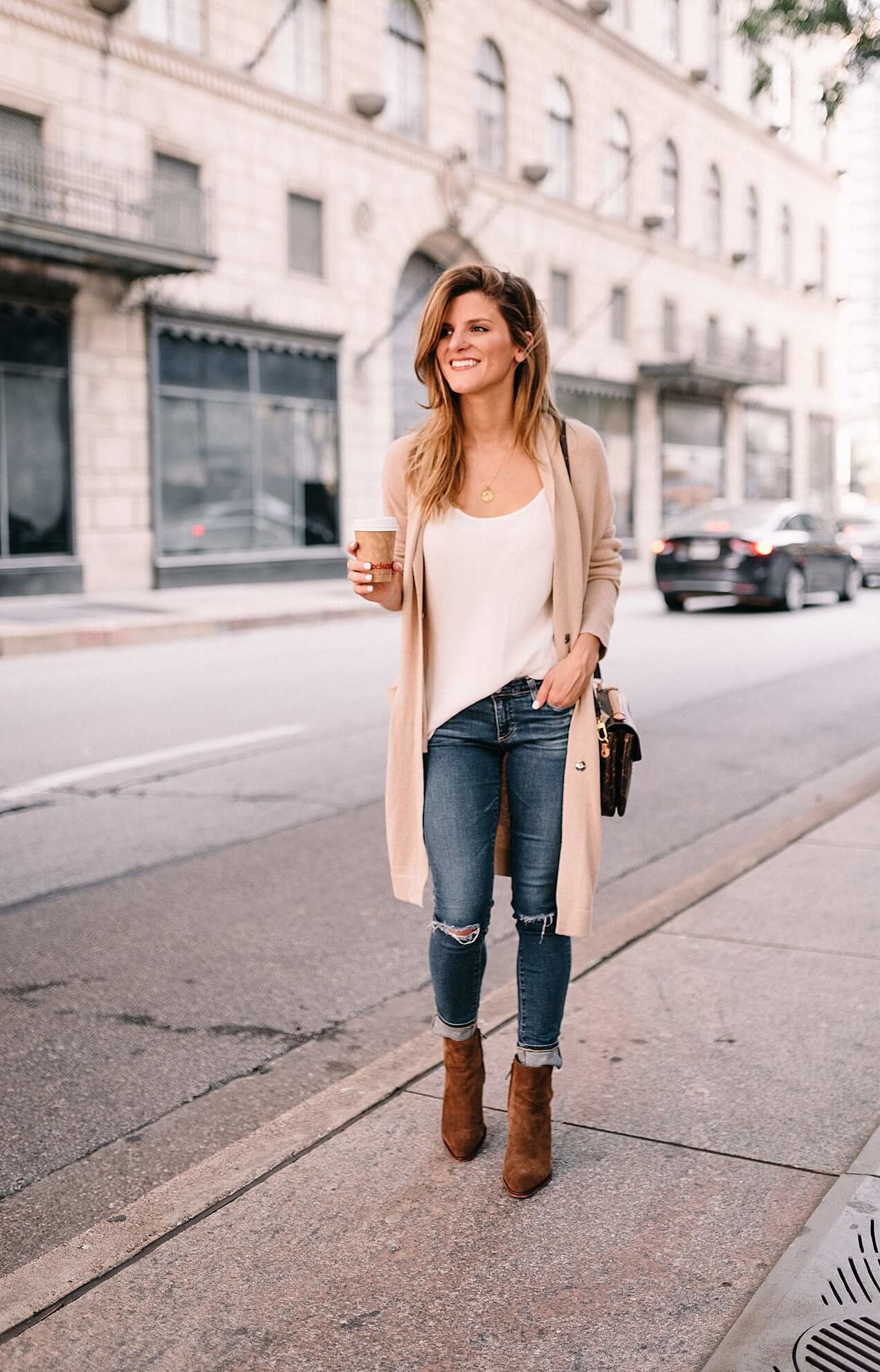 club monaco white tank, off white long cardigan, distressed denim, brown suede ankle booties
