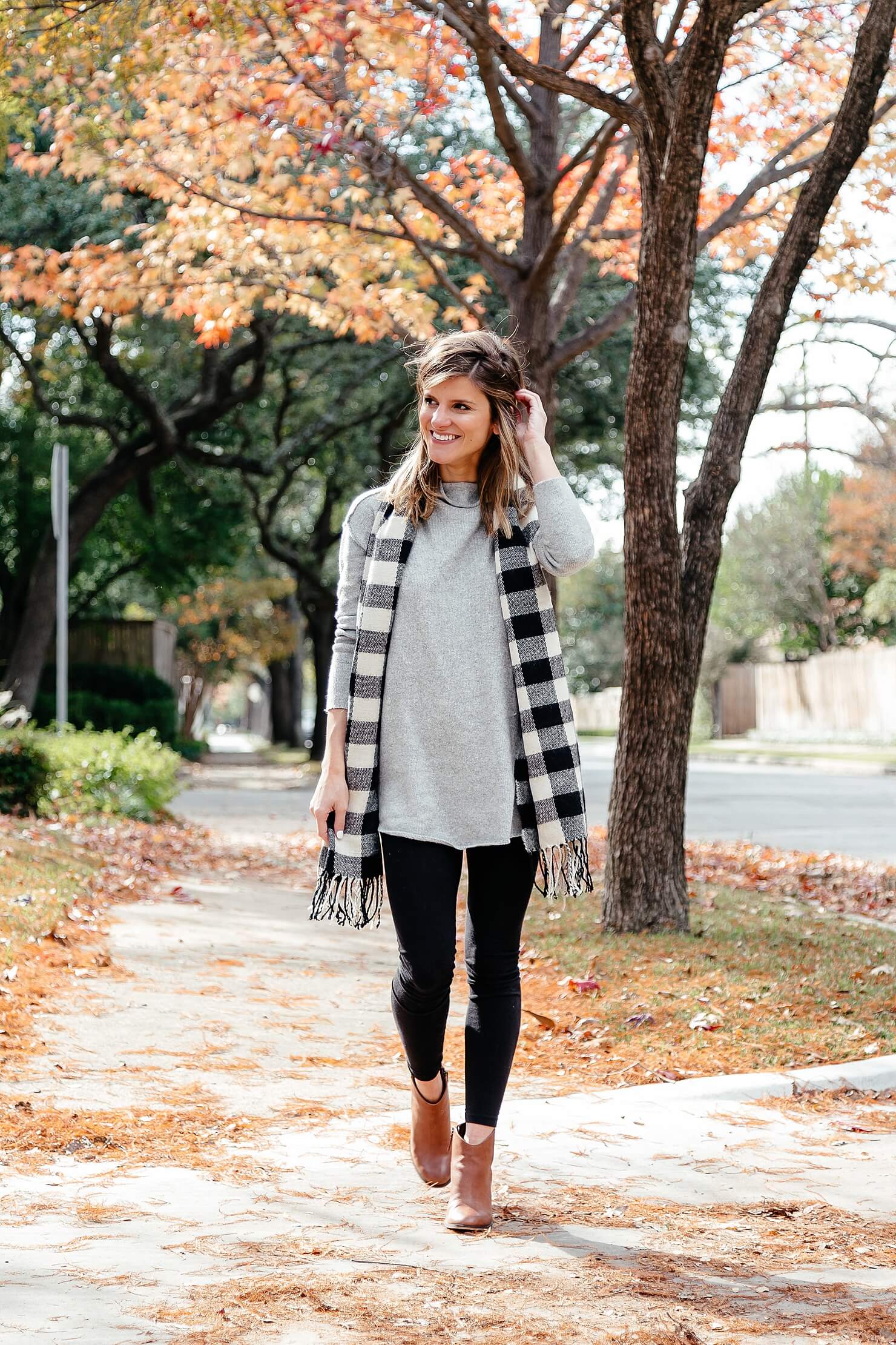black leggings outfit with grey tunic, scarf, brown booties 16