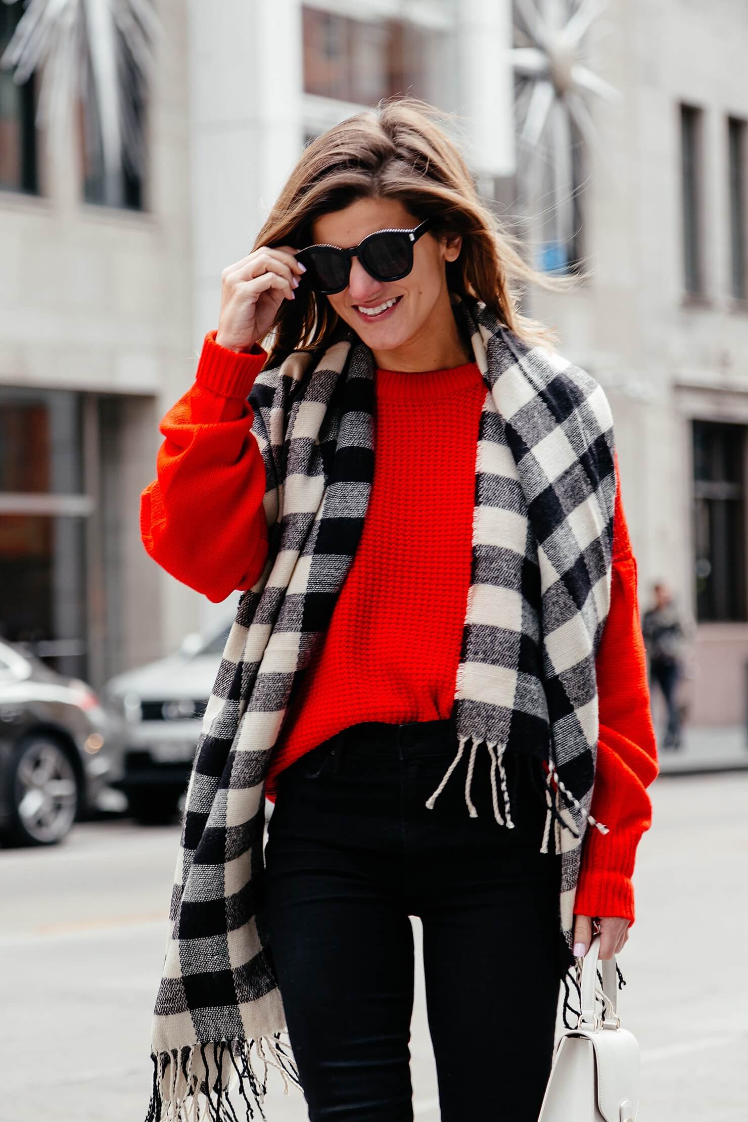 red sweater, black jeans, white booties, and plaid scarf outfit O105-2