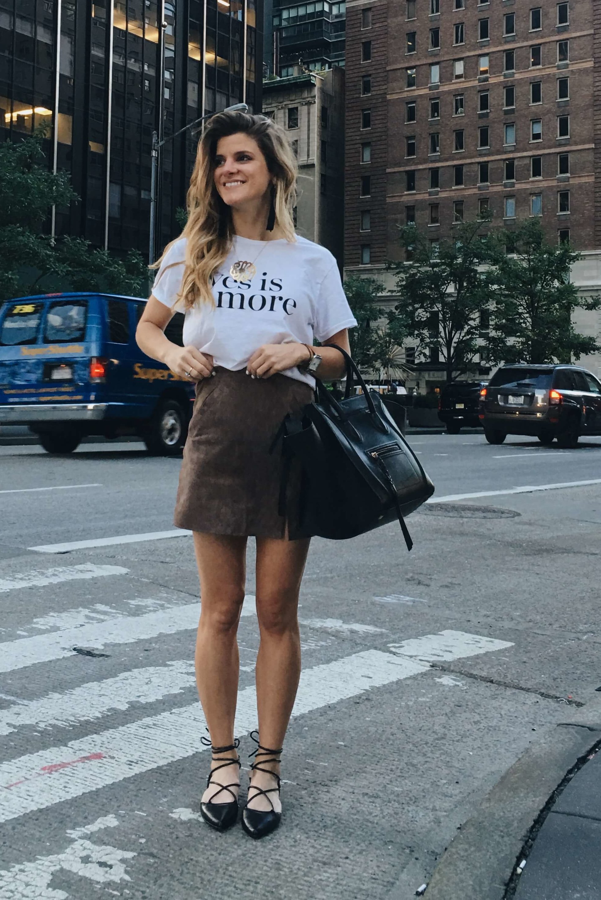 suede mini skirt with simple graphic tee and strappy flats