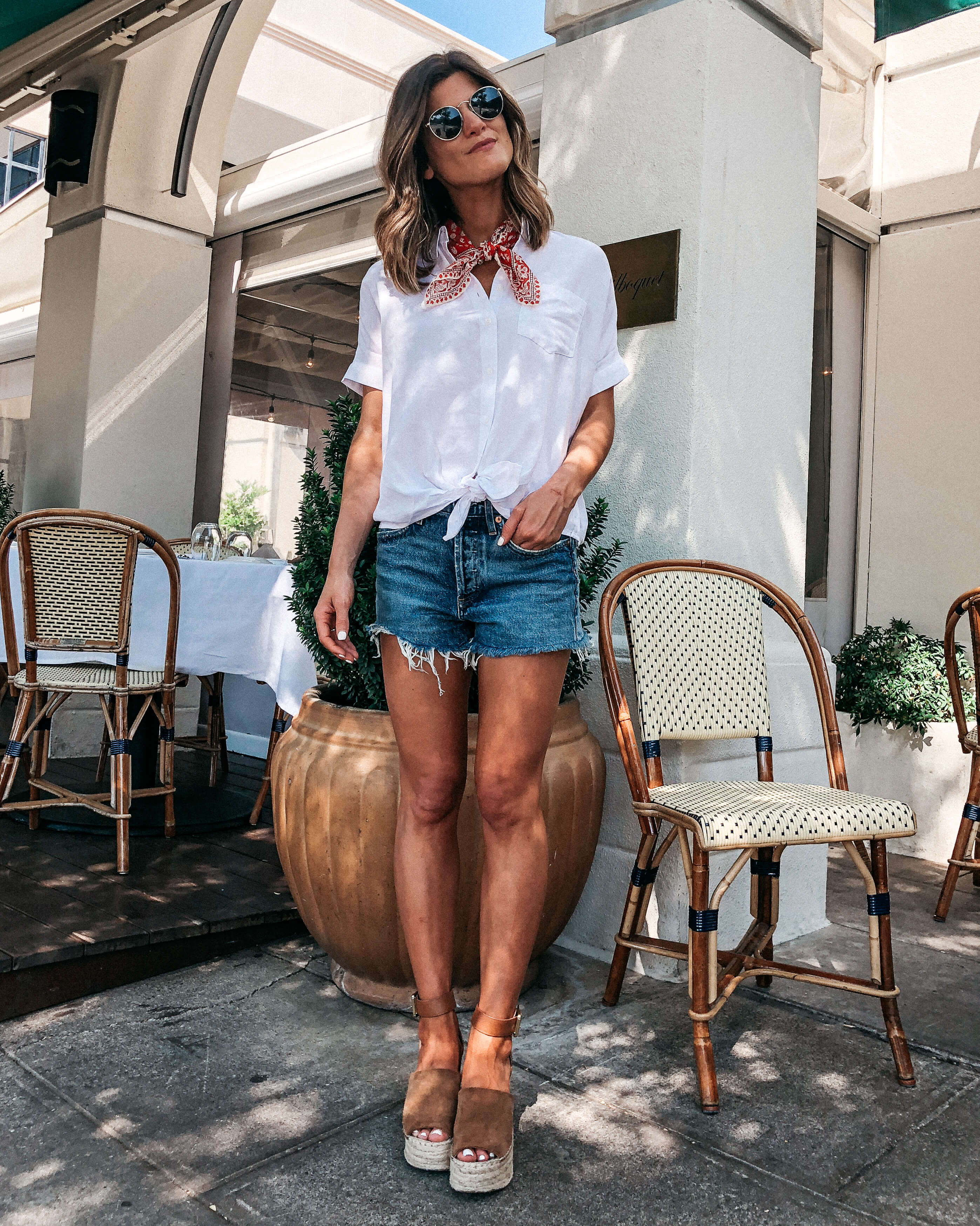 summer capsule wardrobe essentials jeans shorts outfit red madewell bandana tied around neck