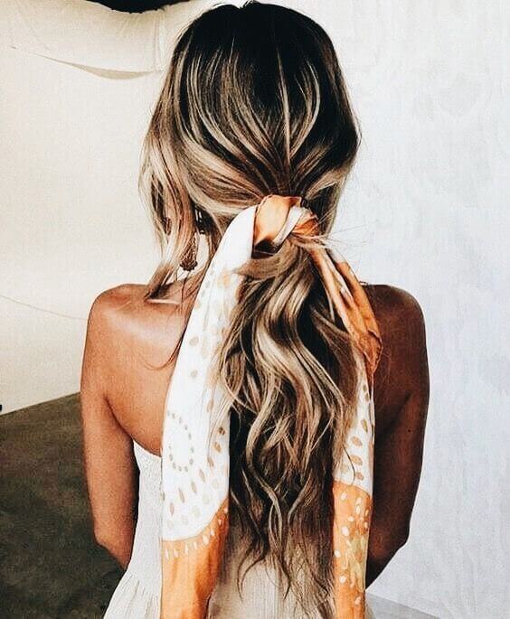 ways to wear a bandana: tie bandana around ponytail