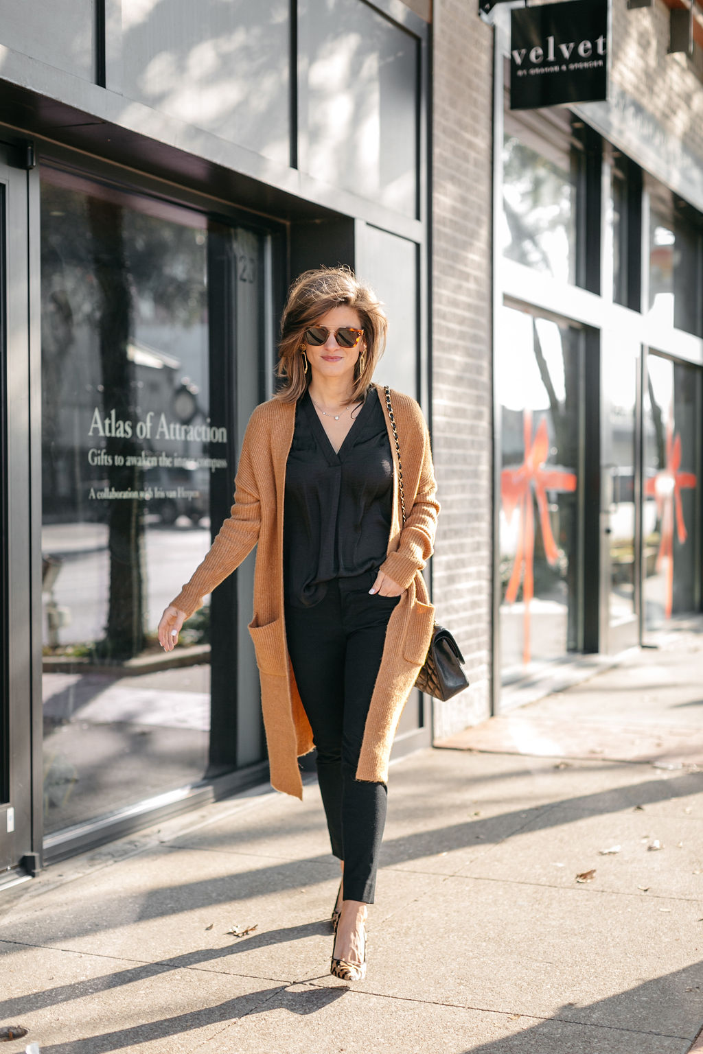 business casual all black outfit long cardigan leopard pumps