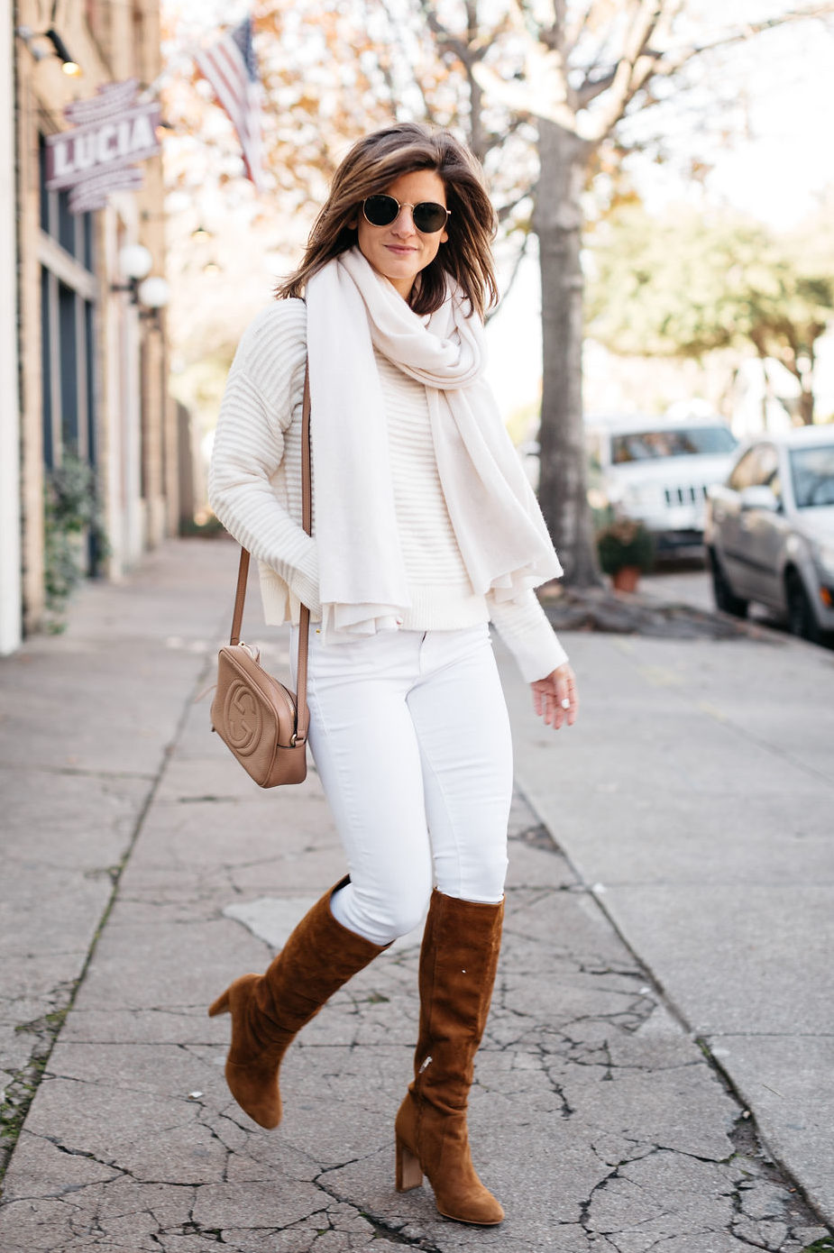 winter white outfit, brighton keller wearing white jeans and cream sweater monochromatic outfit