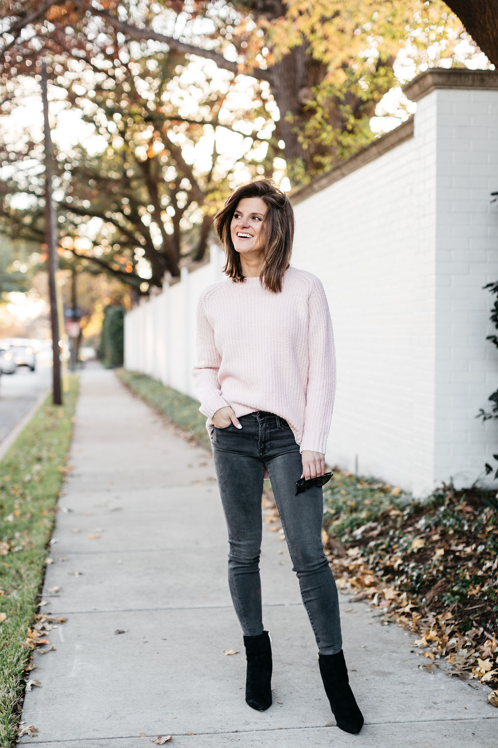 brighton keller wearing grey jeans pink sweater and black booties, blog post on lessons I learned in 2018