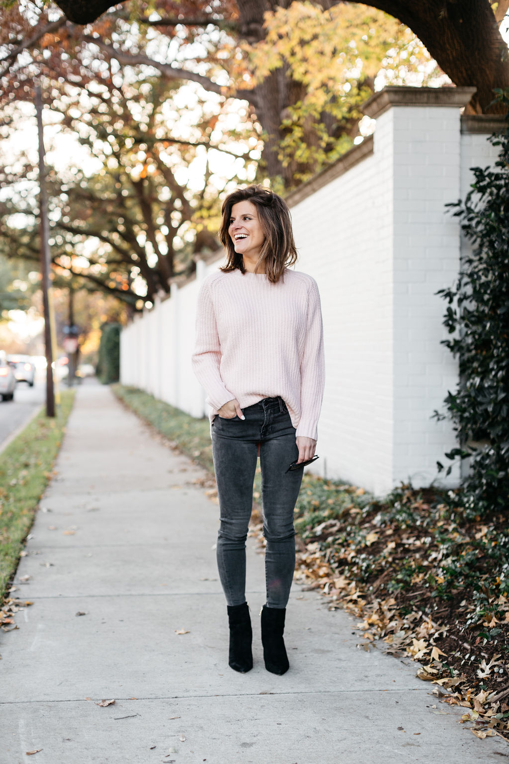 brighton keller wearing grey jeans pink sweater and black booties, blog post on lessons I learned in 2018