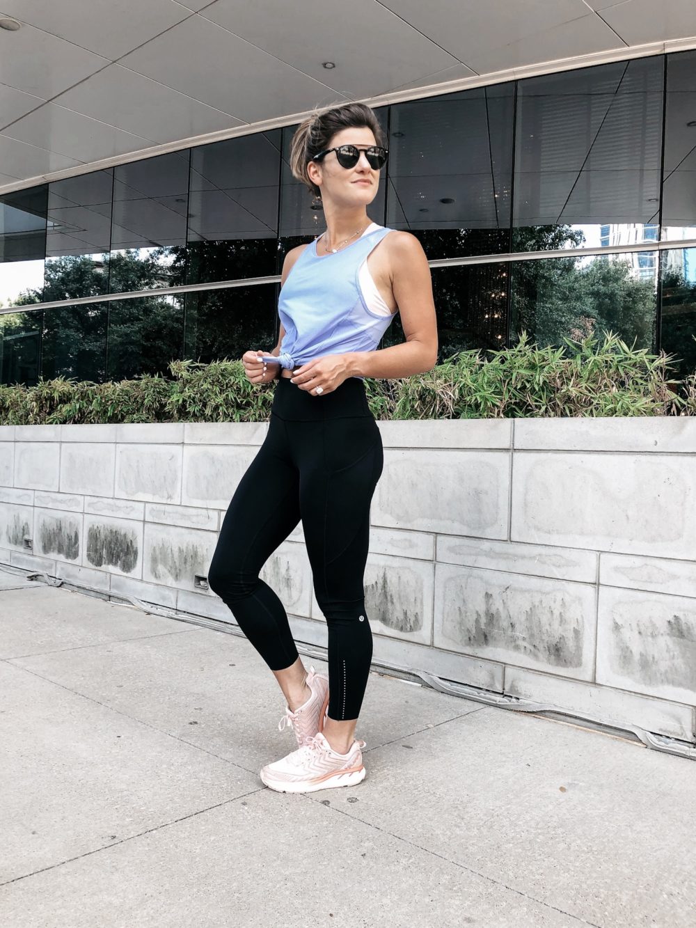 brighton keller wearing lululemon energy bra with fast and free leggings and sculpt tank II, fitness outfit