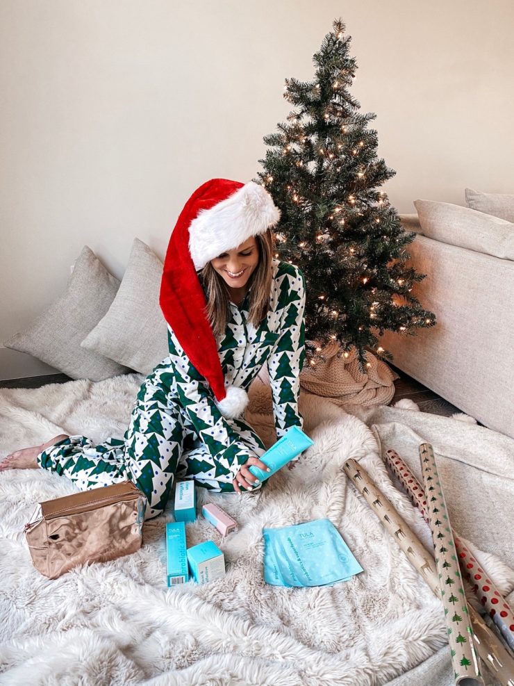 Brighton Keller wearing Christmas tree pajamas