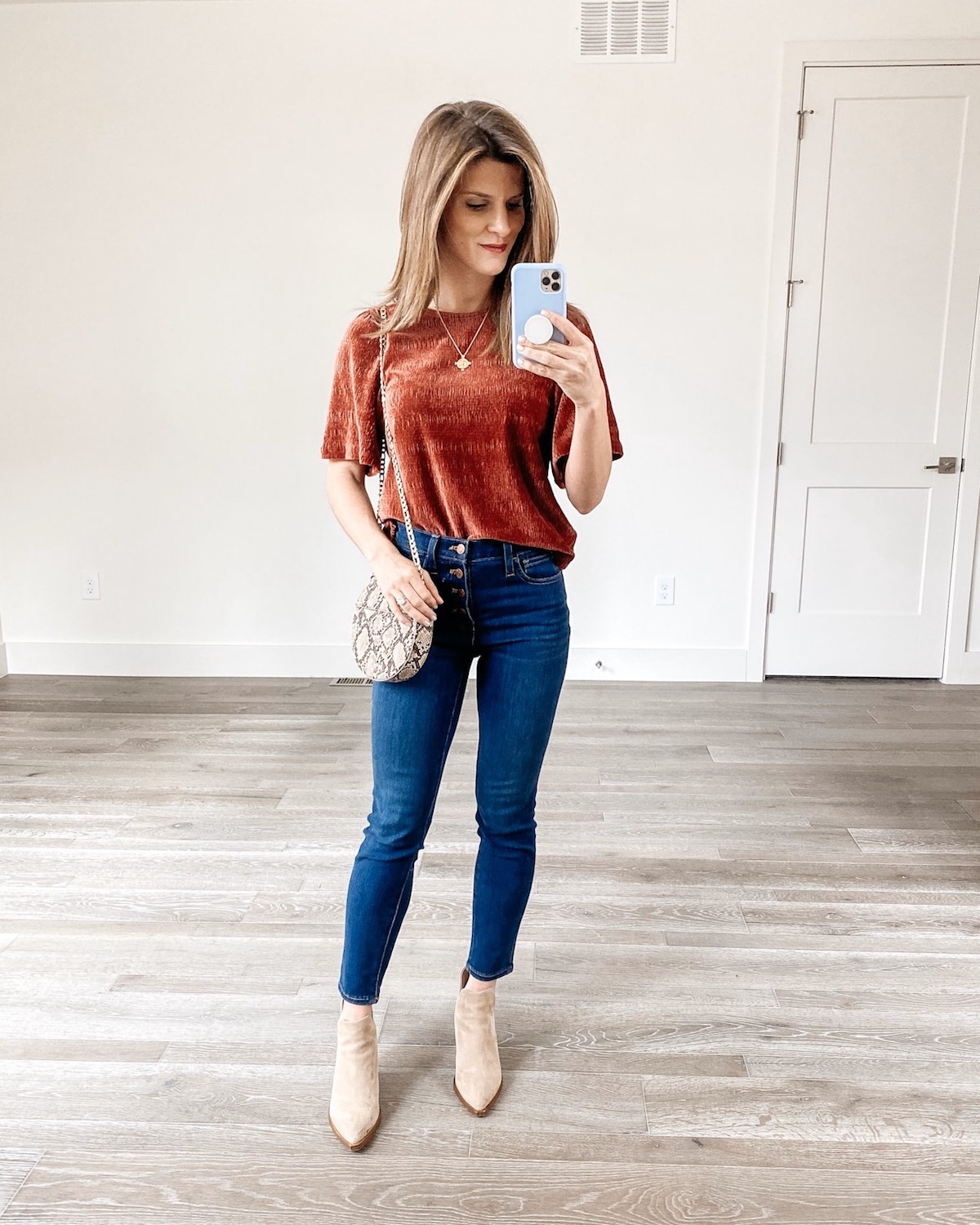 Brighton Keller wearing madewell top and jeans