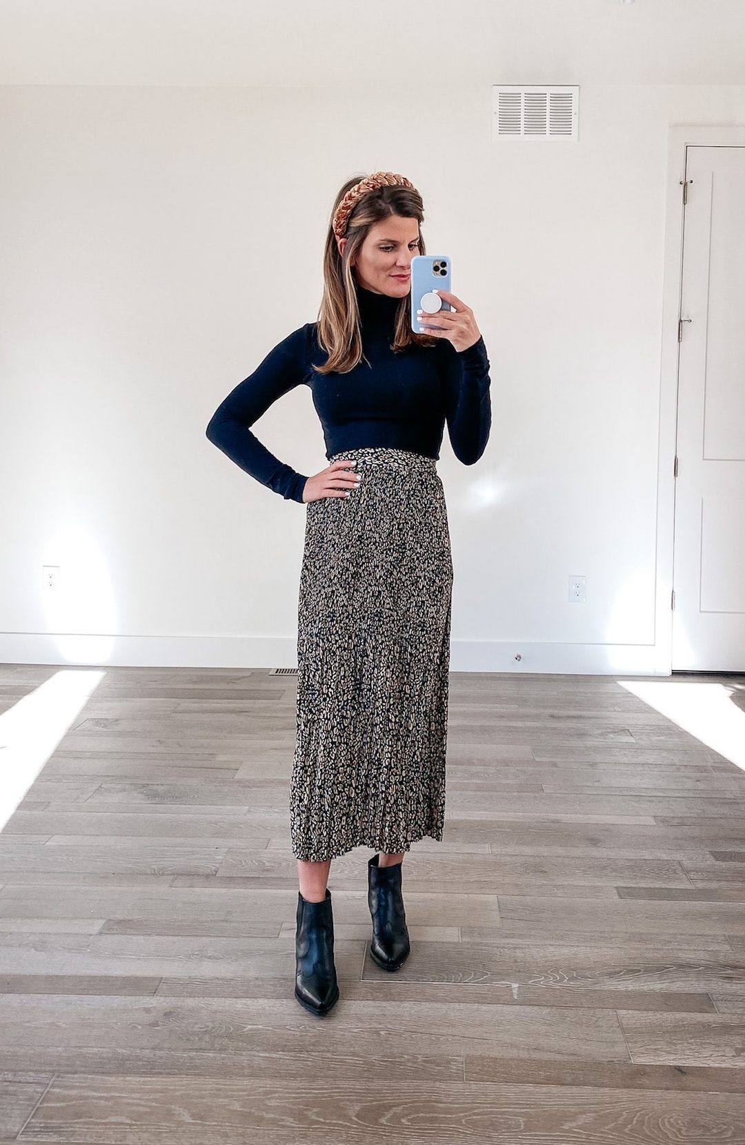 how to style a black turtleneck, midi skirt, black booties, winter outfit, business casual look