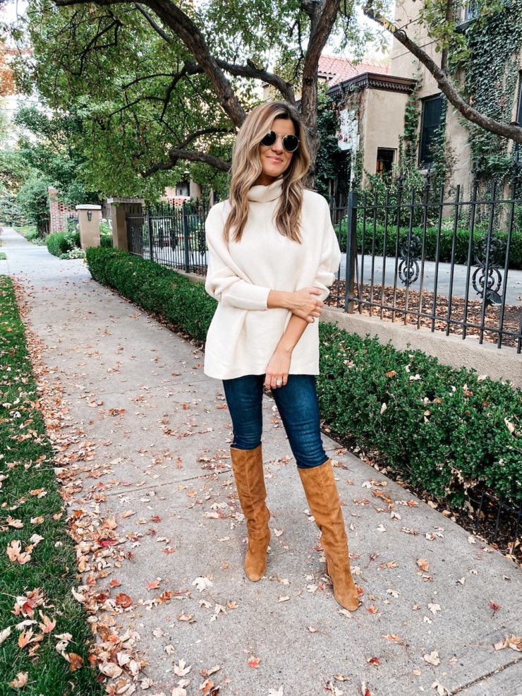 Cream Amazon Sweater, brighton butler wearing oversized cream sweater with maternity jeans and tall boots, fall outfit idea