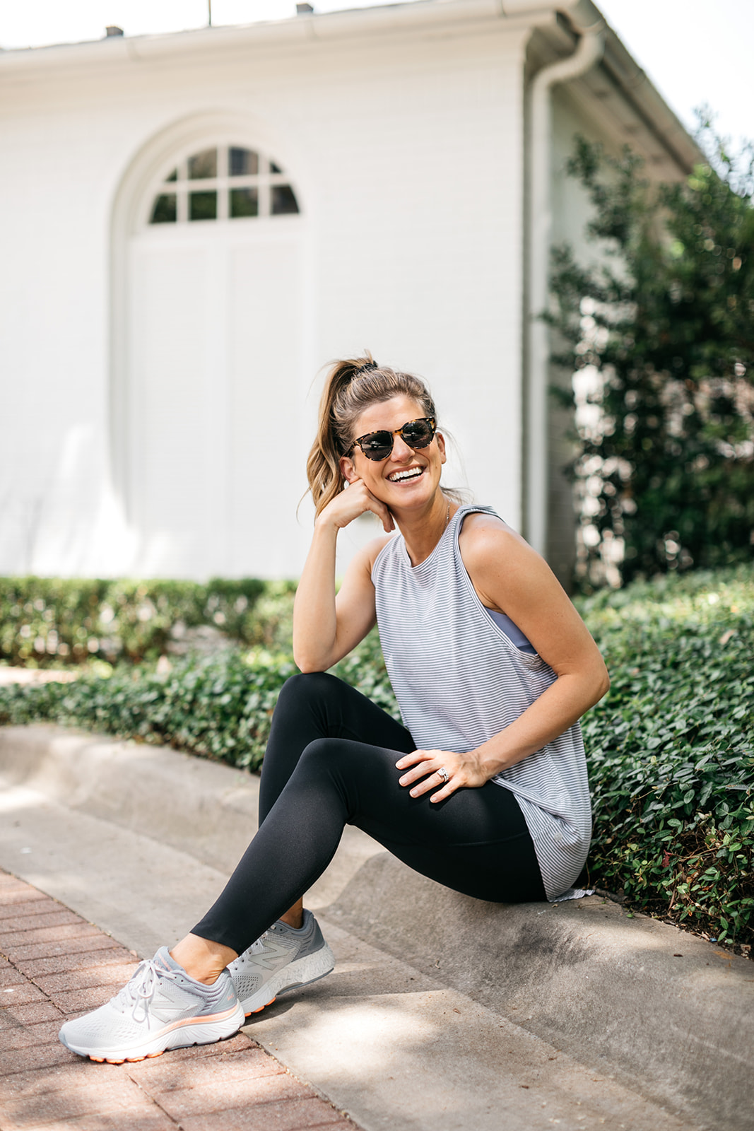brighton butler wearing nordstrom athleisure white and grey tank with black leggings