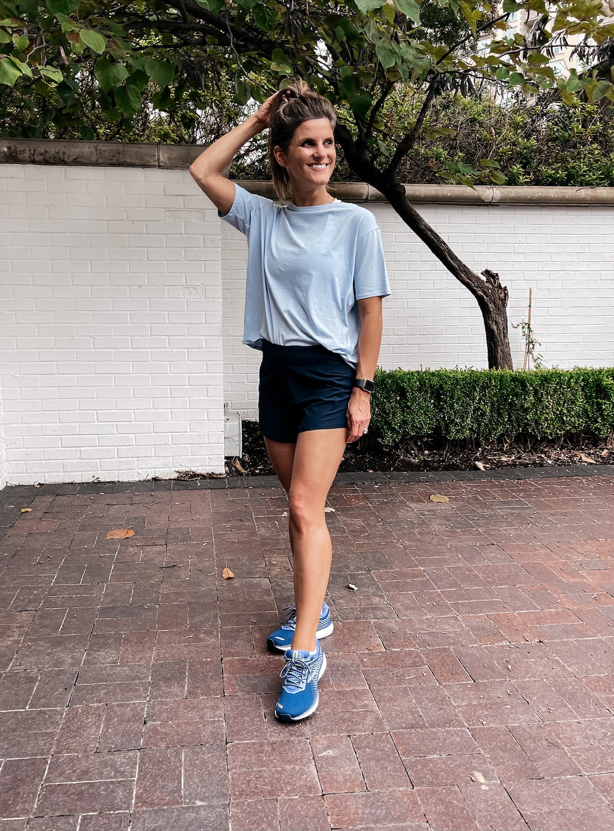 Brighton butler lululemon blue back in action tee and navy shorts