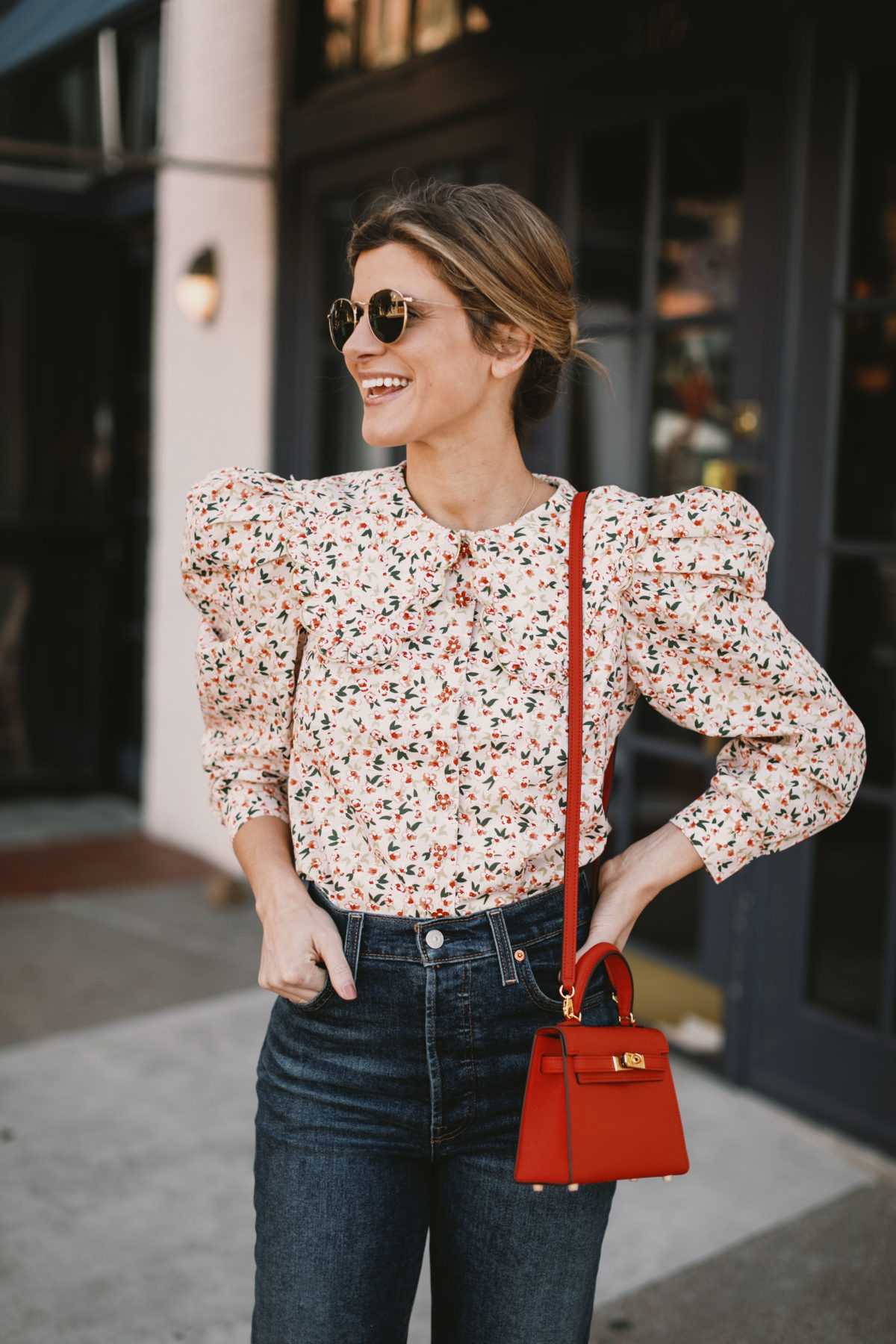 Bright Butler wearing CeliaB floral shirt and J.Crew booties