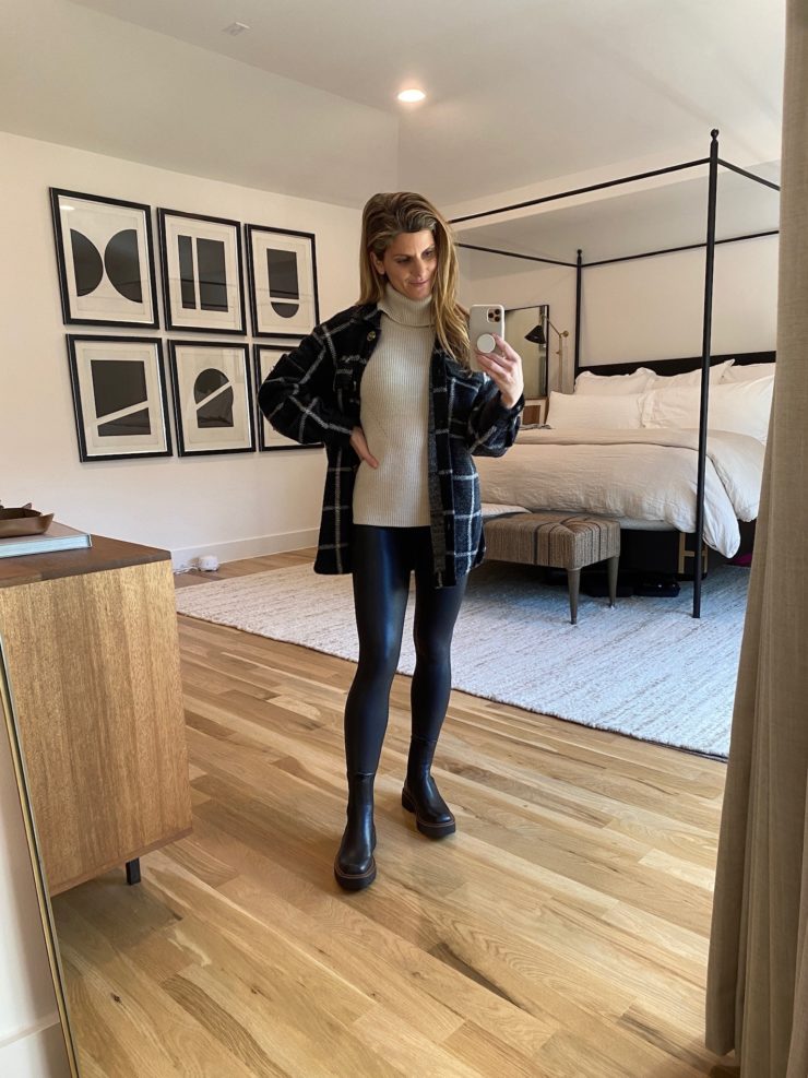 Brighton Butler wearing shacket, sweater, leather leggings and boots