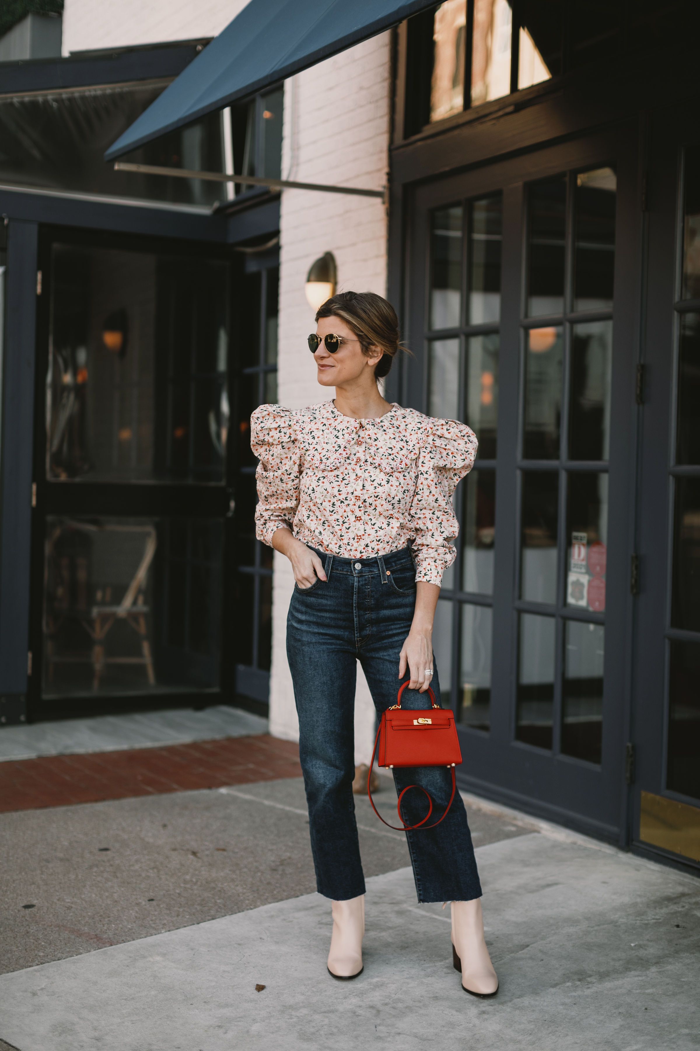 brighton butler jeans and booties outfit with feminine floral top