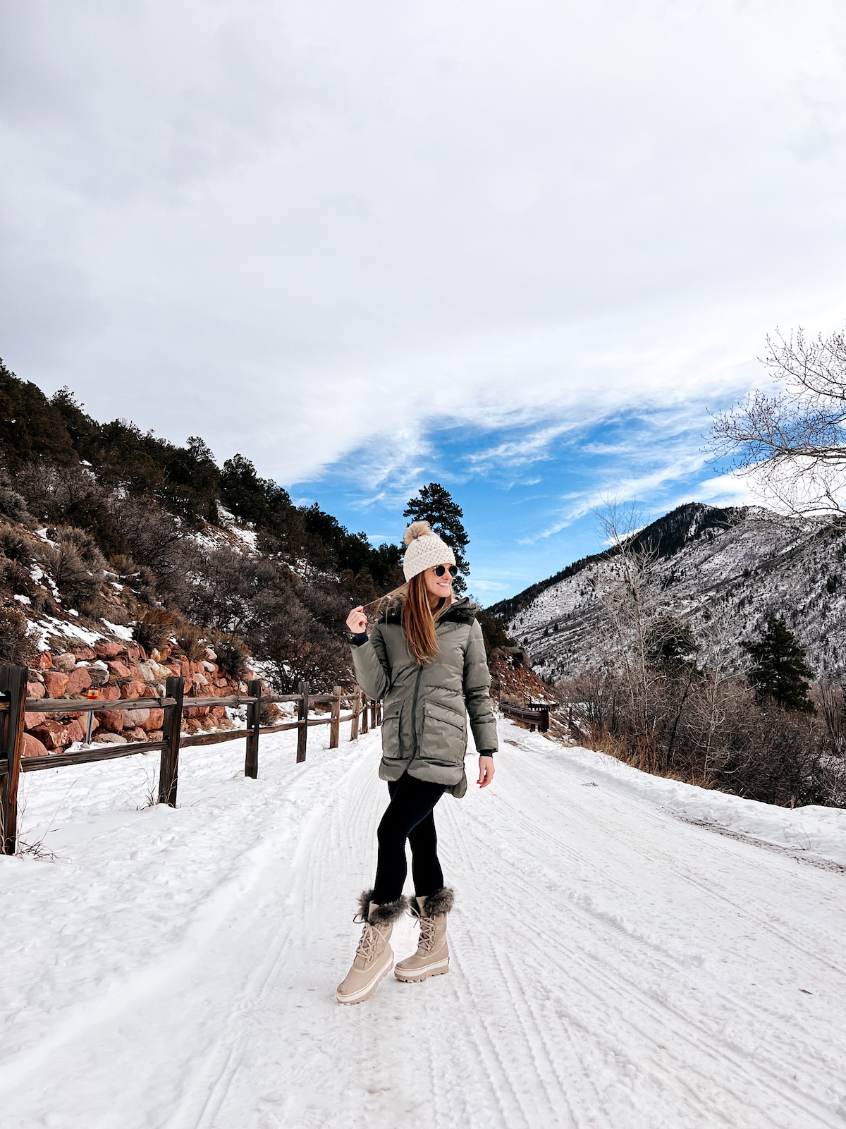 Backcountry green parka and beyond yoga leggings with sorel boots