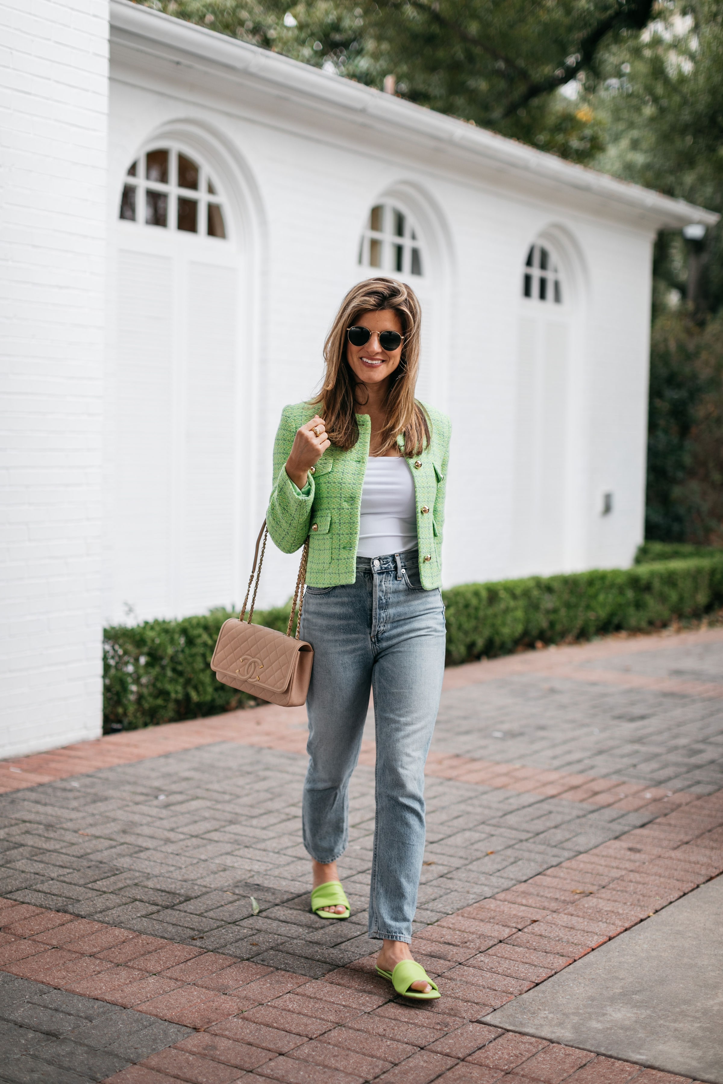 Brighton Butler wearing green spring jacket with lime green sandals
