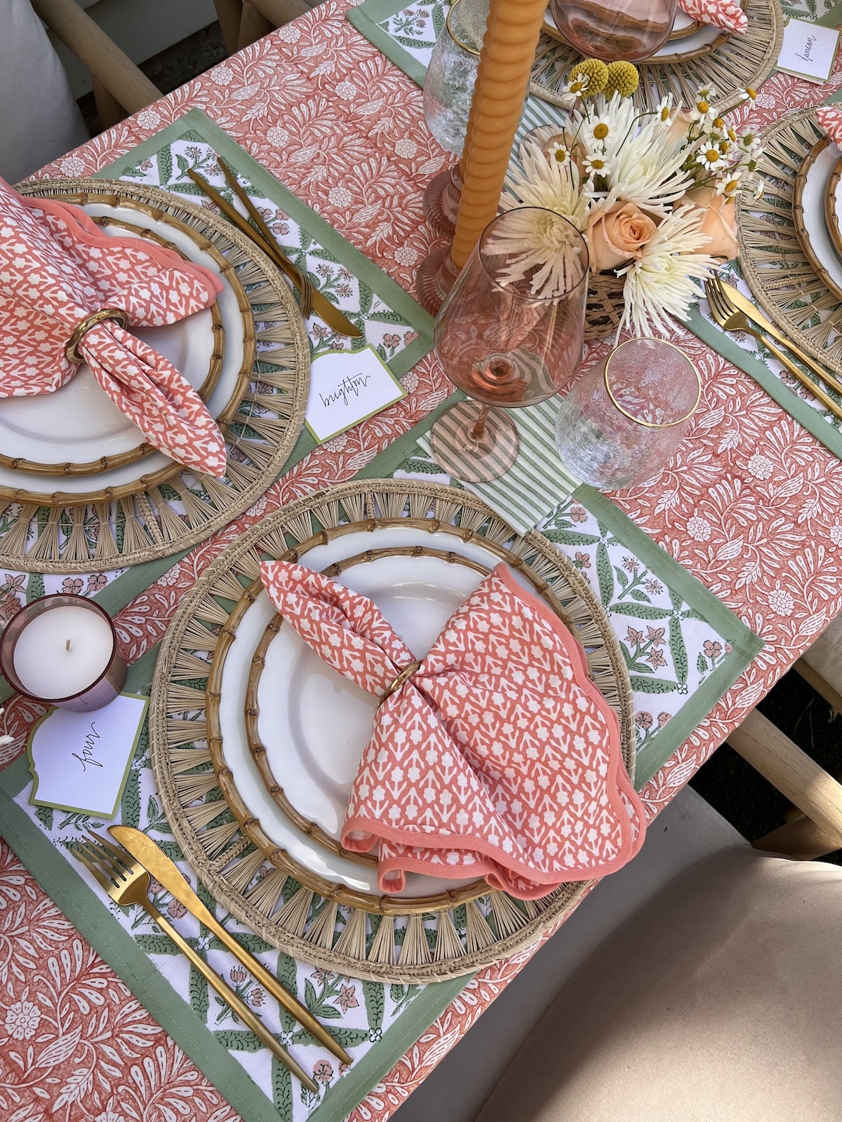 Brighton Butler spring tablescape, coral and green table setting, Amanda lindroth tablecloth, juliska bamboo dinner plates, Estelle wine glasses, gold silverware