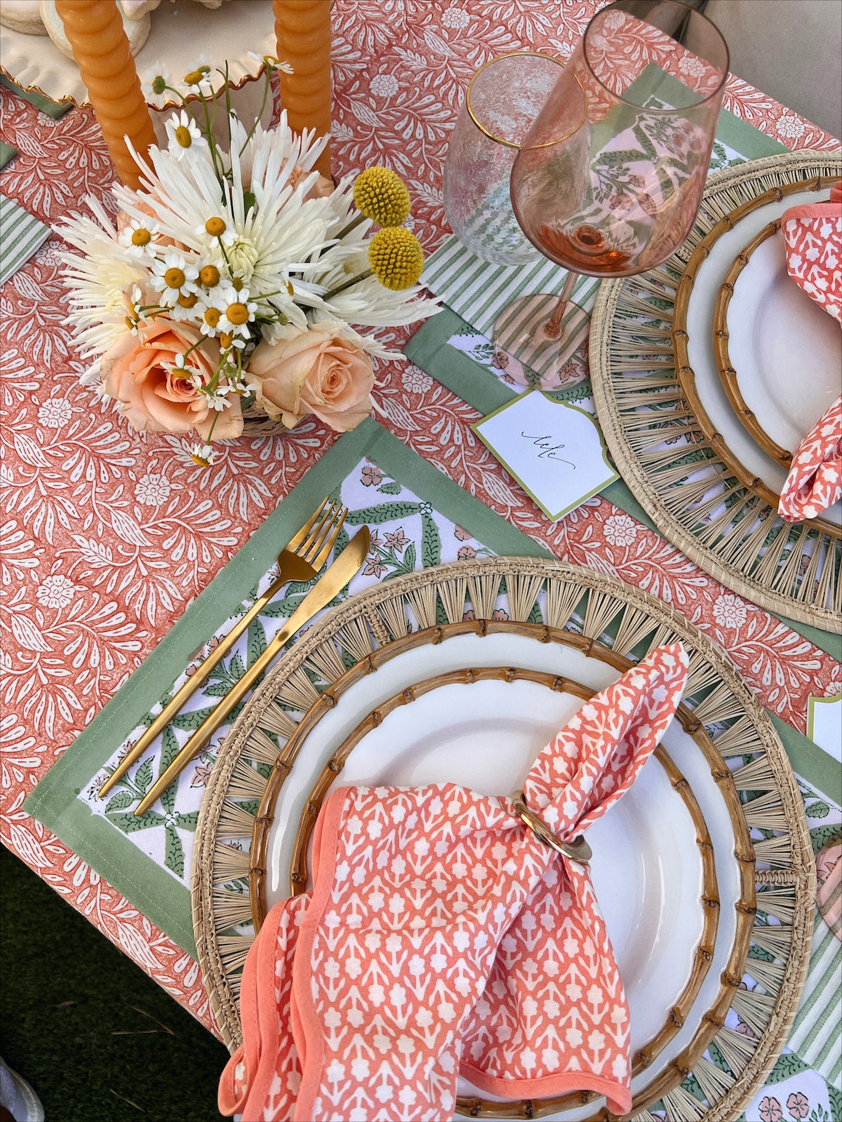 Brighton Butler spring tablescape, coral and green table setting, Amanda lindroth tablecloth, juliska bamboo dinner plates, Estelle wine glasses, gold silverware