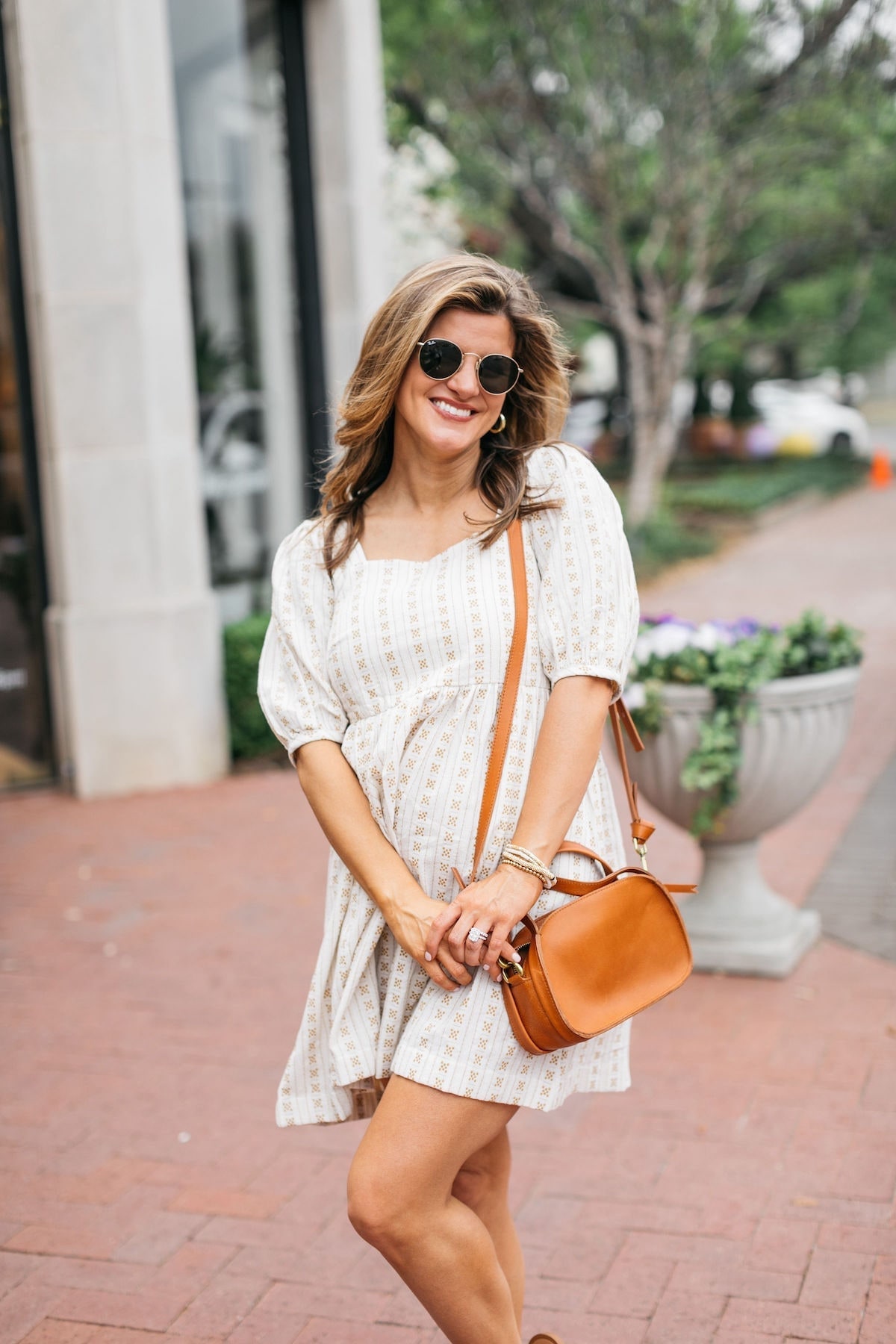Brighton Butler wearing madewell dress and sandals