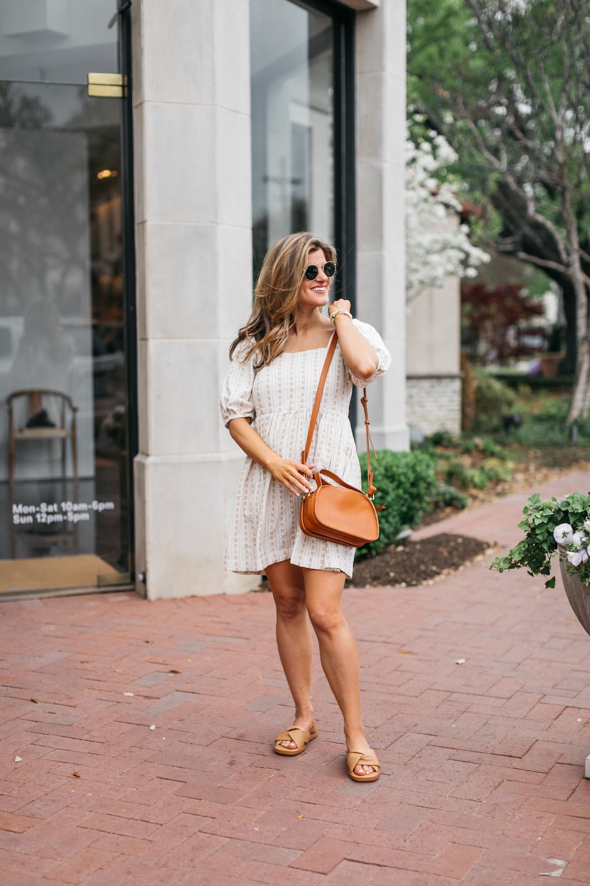 Brighton Butler wearing madewell dress and sandals