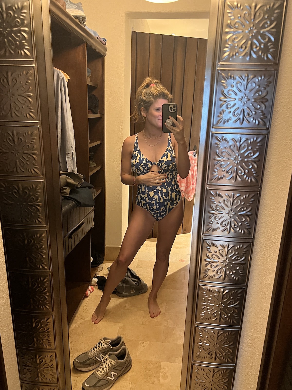 Brighton Butler wearing tory burch blue swimsuit san miguel mexico