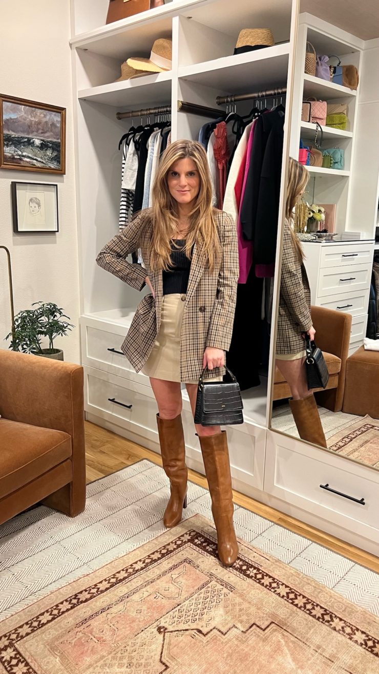 Brighton Butler wearing Kahki skirt with goldy boots and madewell blazer