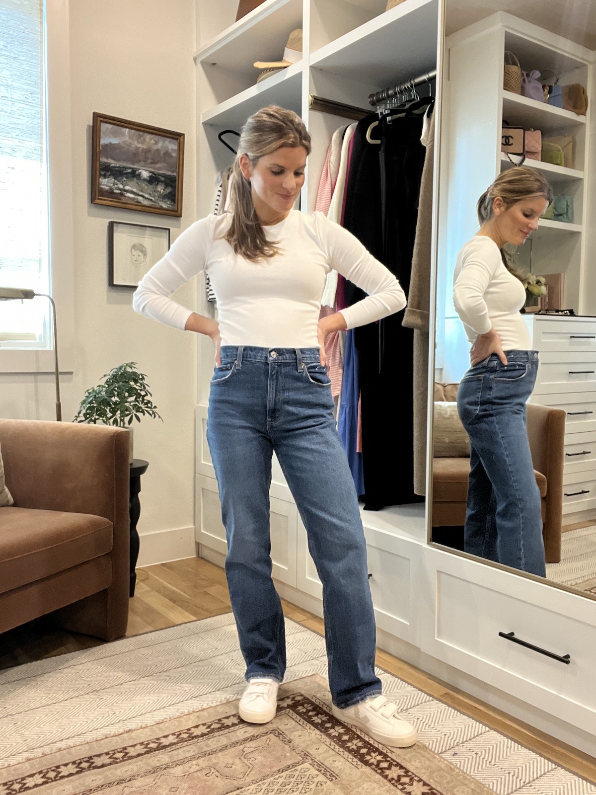 Brighton Butler wearing abercrombie ultra high rise 90s straight denim and white long sleeve